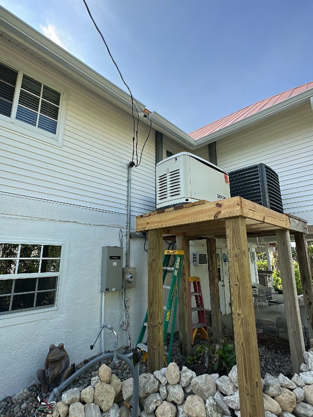 White K-Style Gutters Installed with White Downspouts in Sanibel FL by Gutter Professors