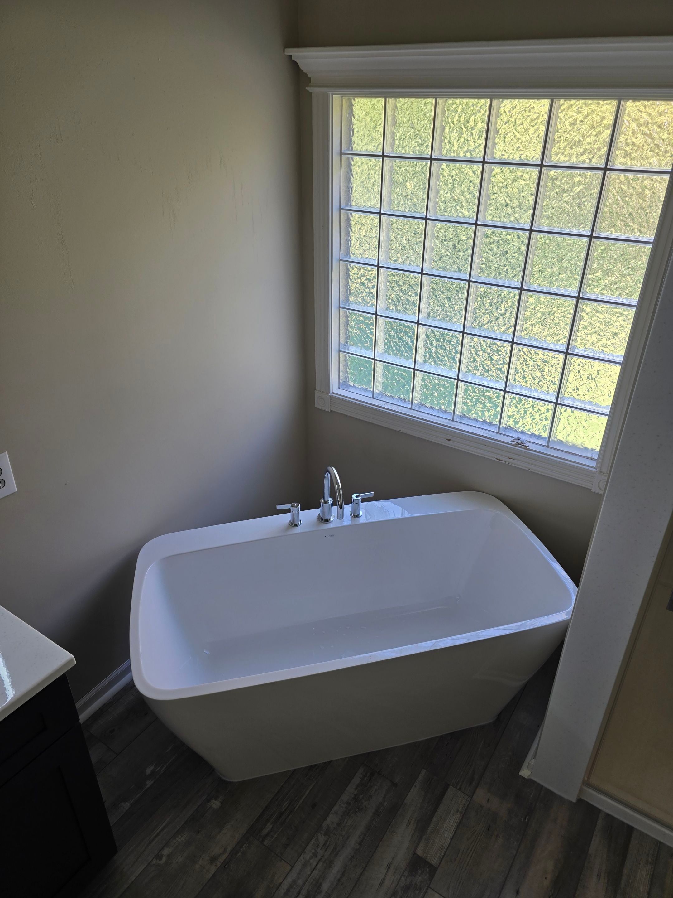Full bathroom remodel with Artus lighted mirrors, Waltz bathtub and Mercury doors by The Shower Company