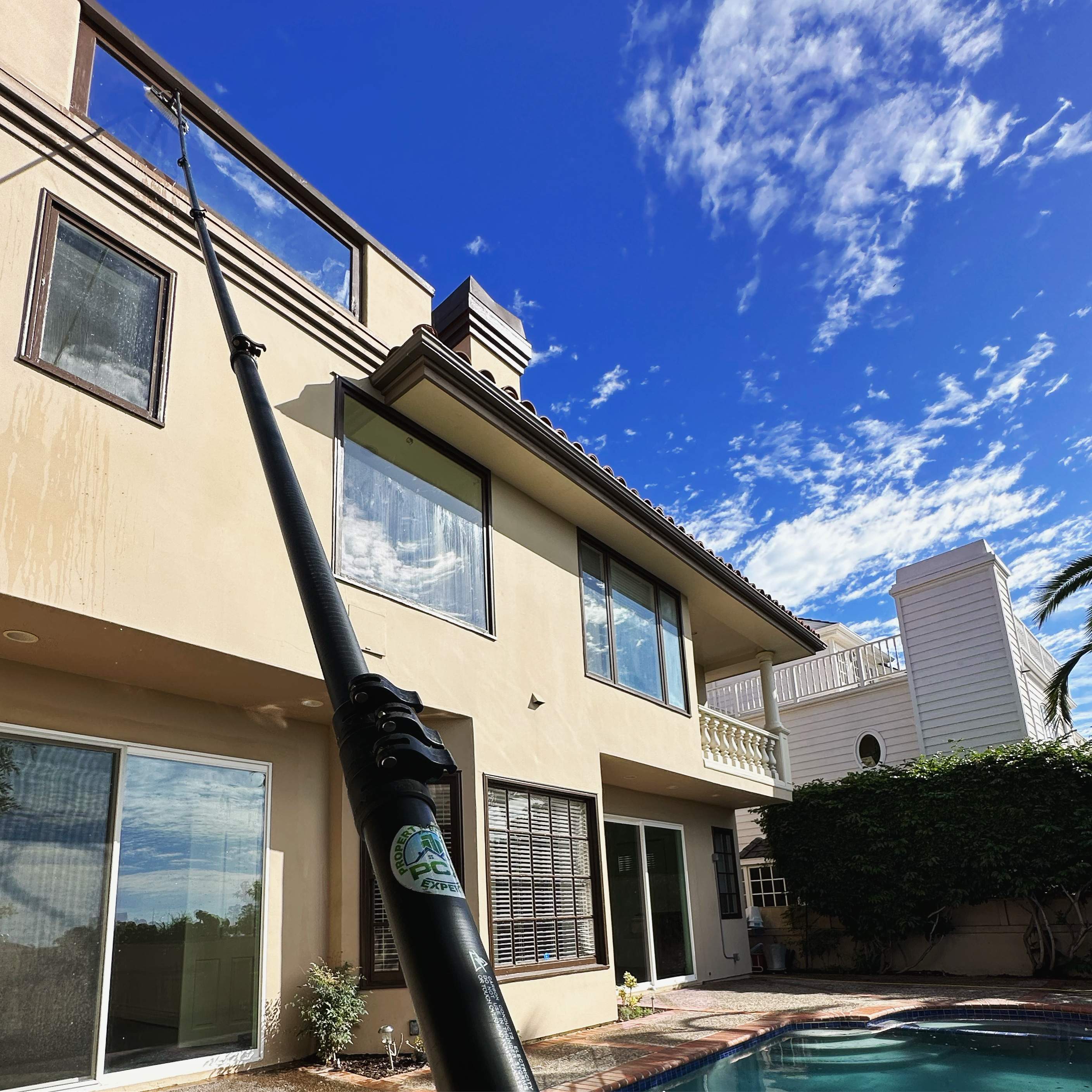 Orange County Clay Tile Roof Soft Wash on Unwalkwable Roof by Property Cleaning Experts