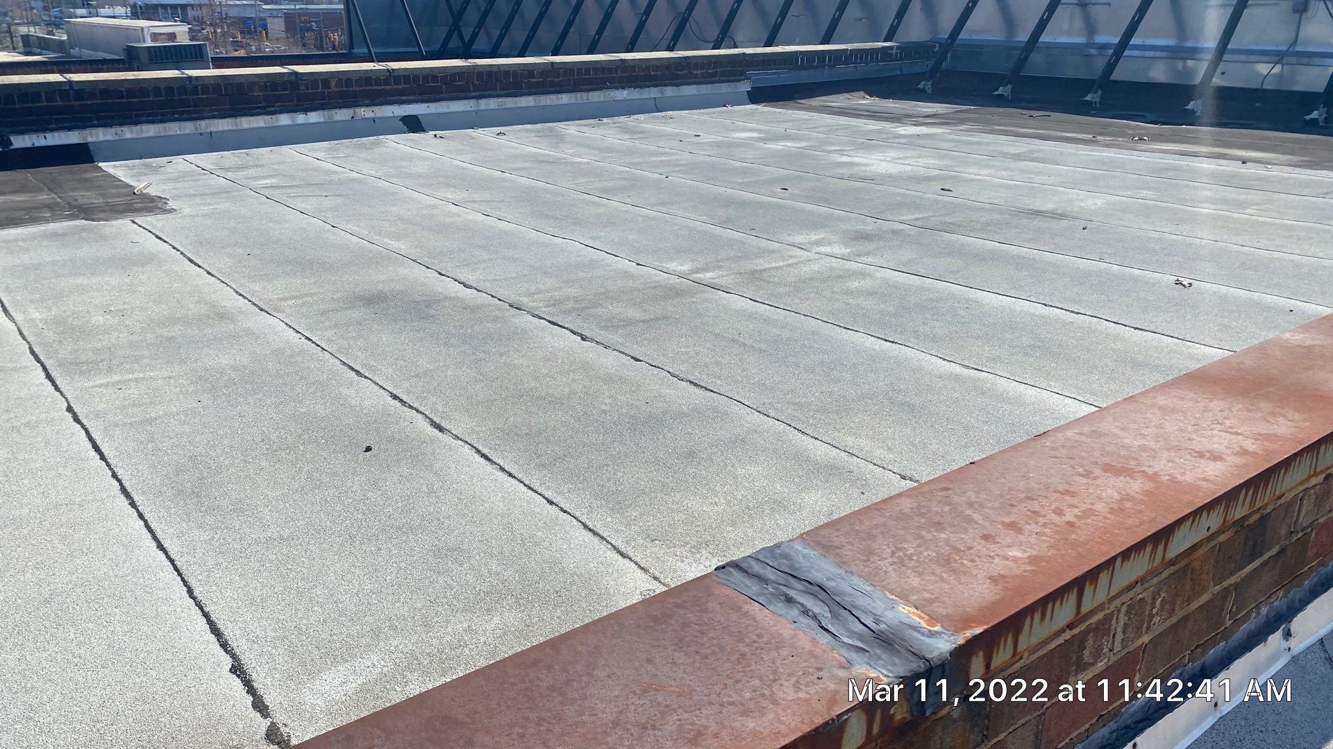 Commercial Roof Coating using Fiberseal basecoat and Silicon Topcoat by Just In Time Roofing and Restoration