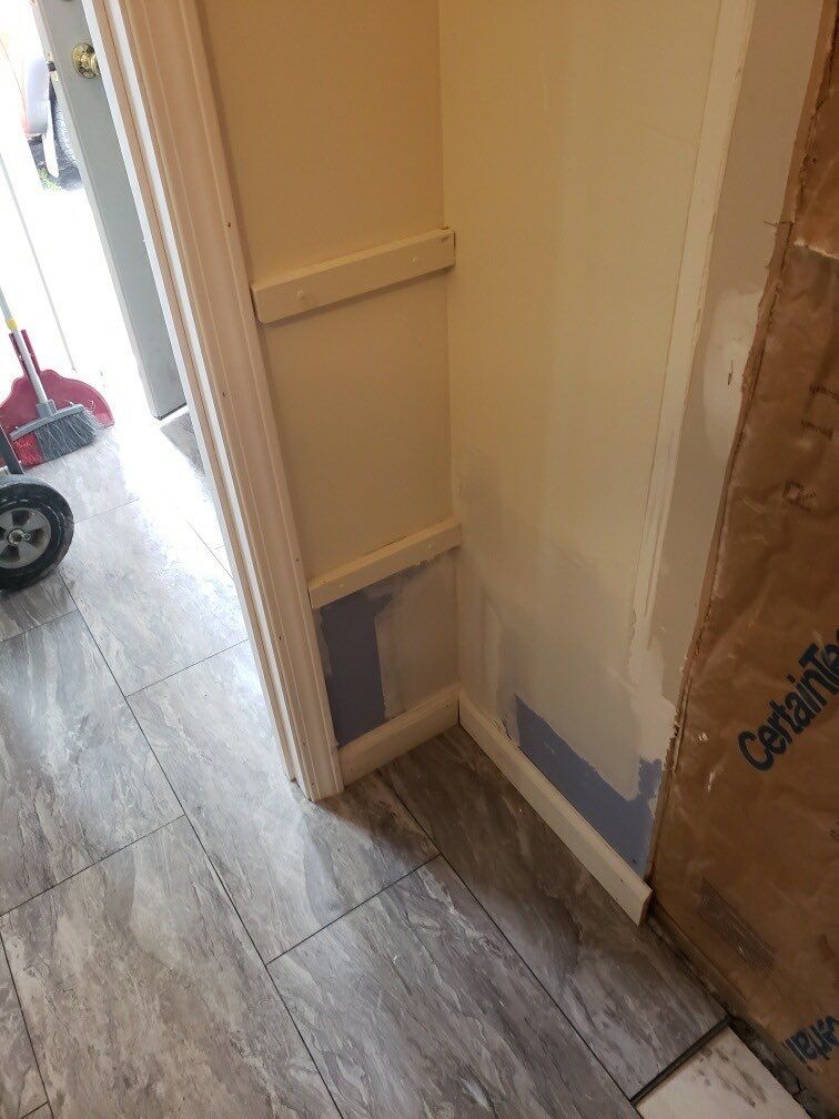 Bathroom Remodel using BCI Acrylic Shower System by Secure Construction Company Inc