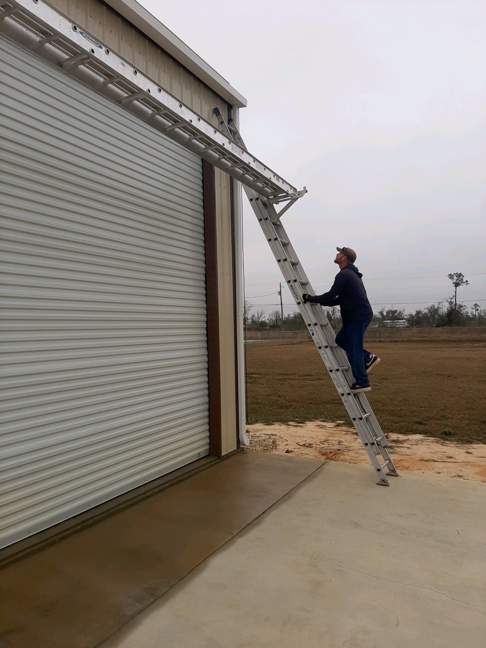 Gutter Installation Using White Seamless Gutters and Gutter Guards by Gutter Professors