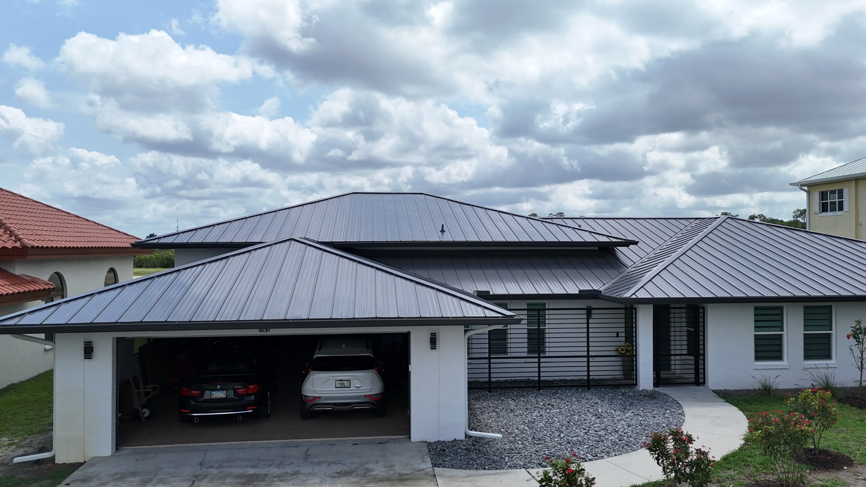 Standing Seam Metal Roof and Solar Powerwall Installation in Naples by Coastal Energy