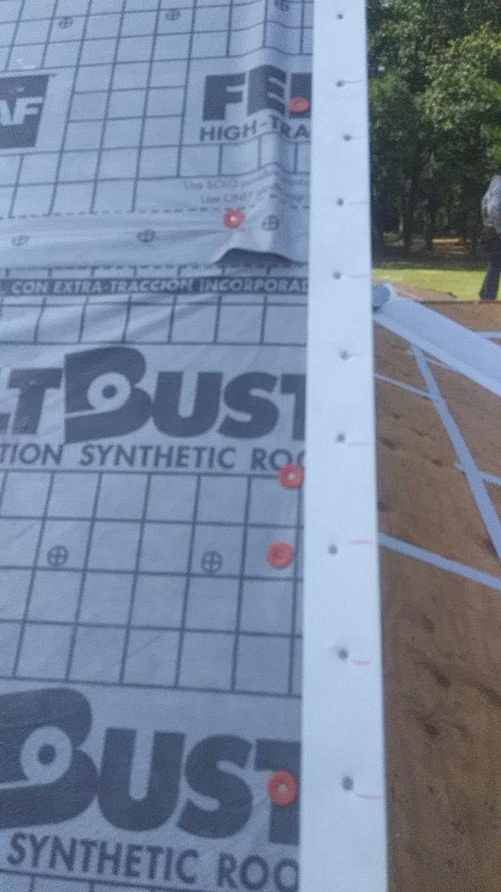 Residential Roofing Installation using Roof Replacement by American Roofing & Construction LLC