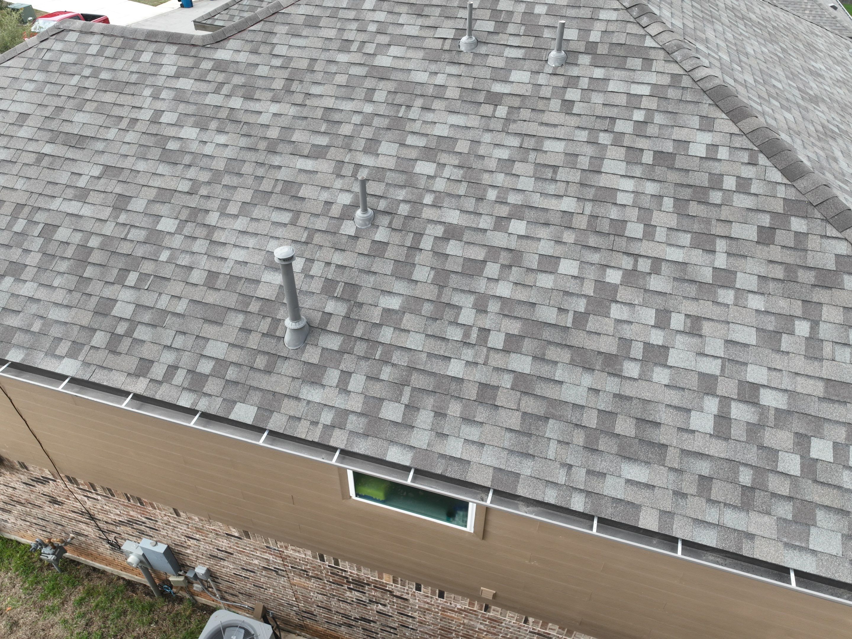 Residential Roofing Installation using Owens Corning 30 year Architectural Shingles by Premier Roofing and Contracting