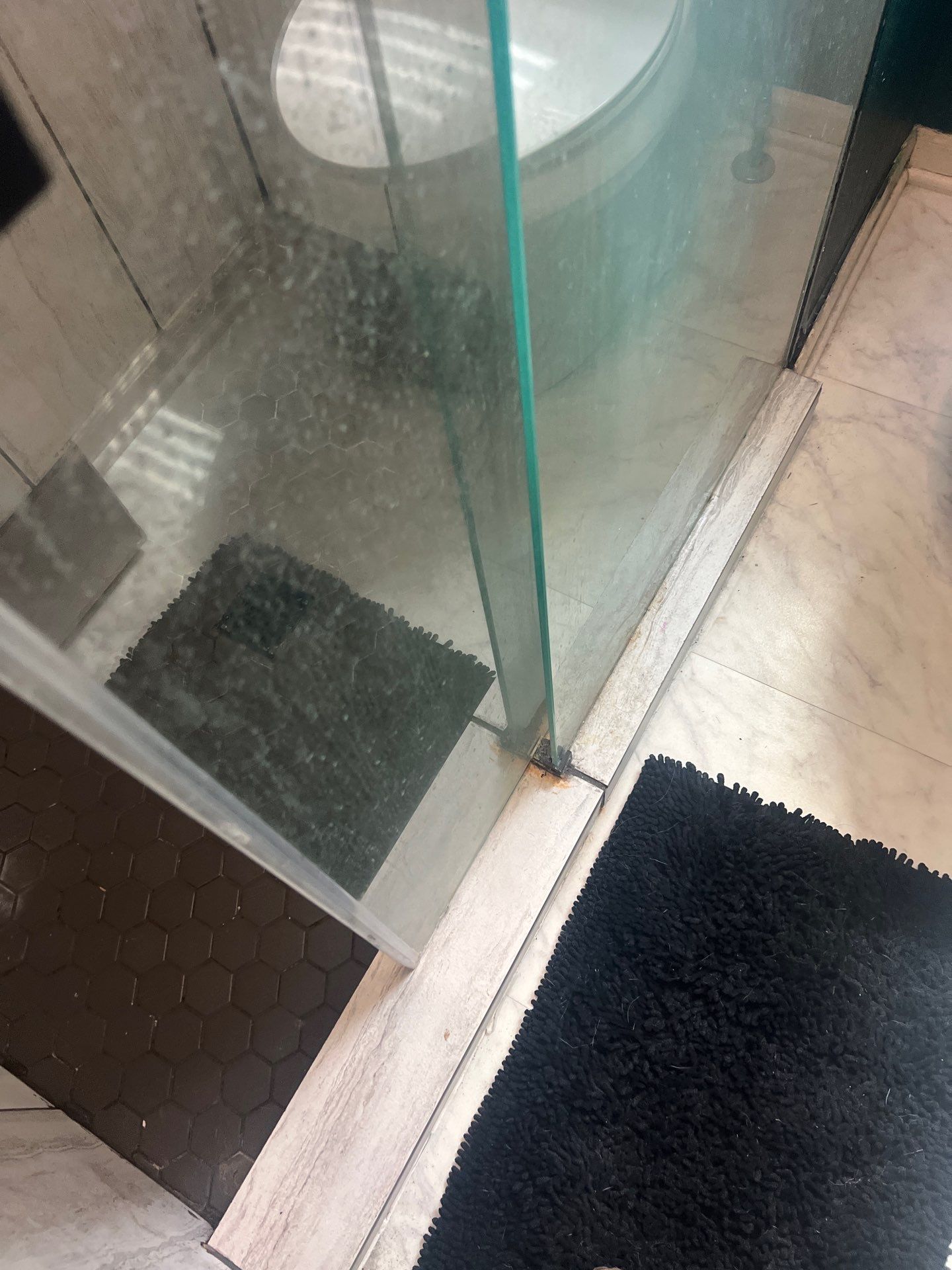 Tile out, Bella Stone in! by The Shower Company