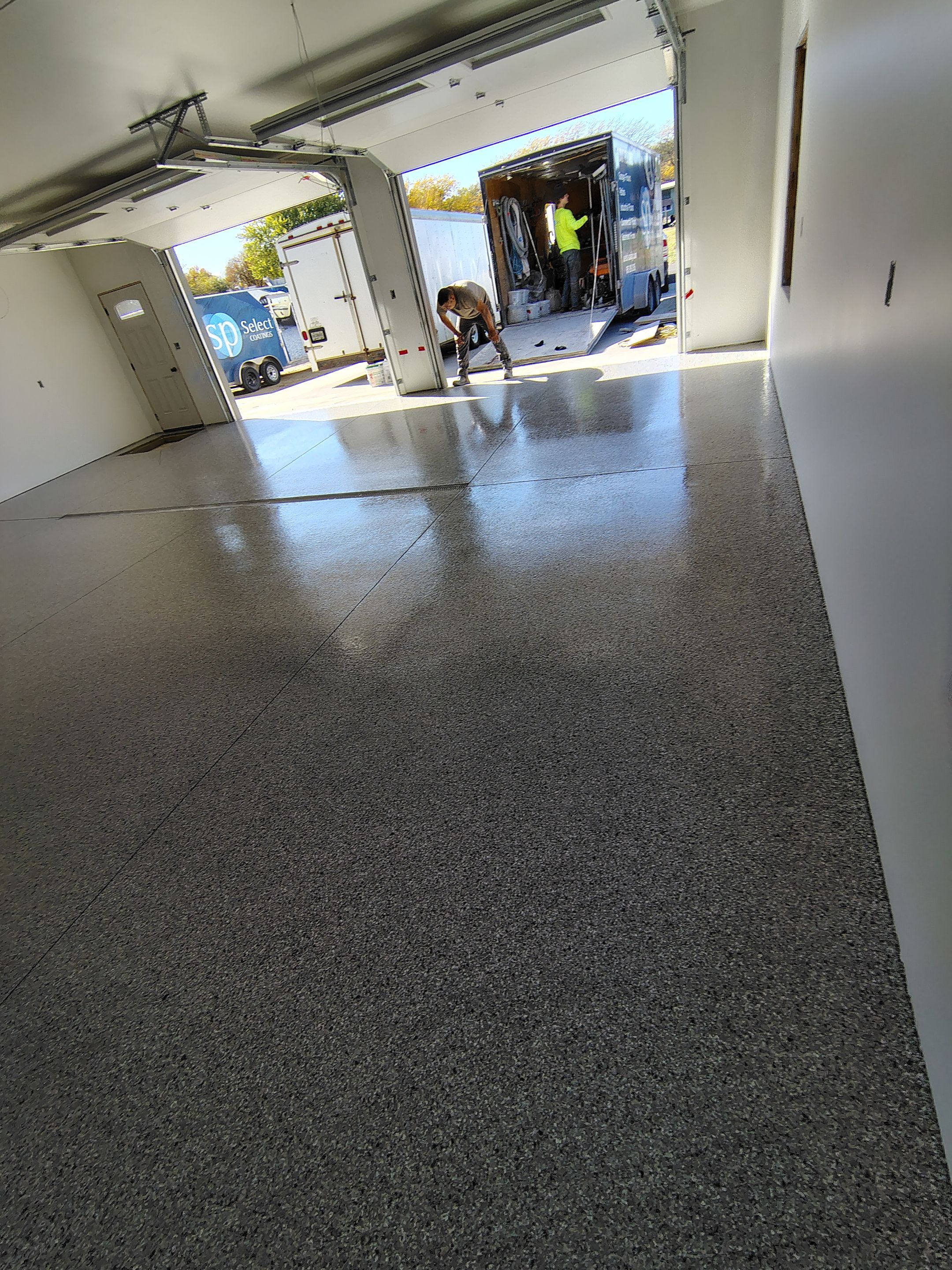 Custom Garage and Basement Epoxy Floor Coating in Menno by Select Painting, Coatings & Garage Cabinets