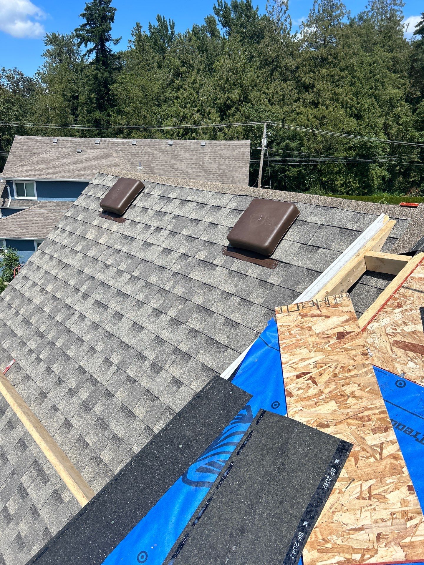 Residential Roofing Installation by Top Notch Roofing Inc