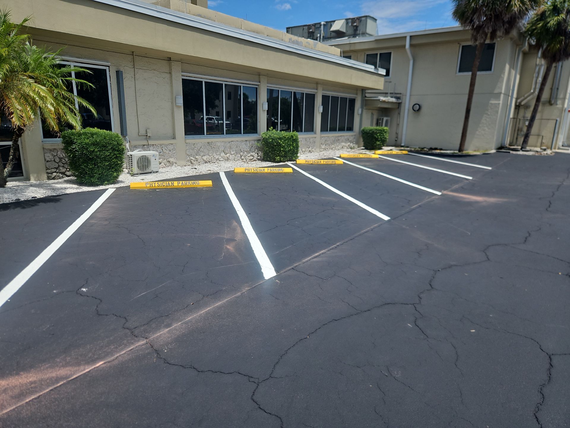 Sealcoating, Line Striping, Truncated Dome Installation - HCA Florida Fawcett Hospital by Everline Coatings & Services - Southwest FL
