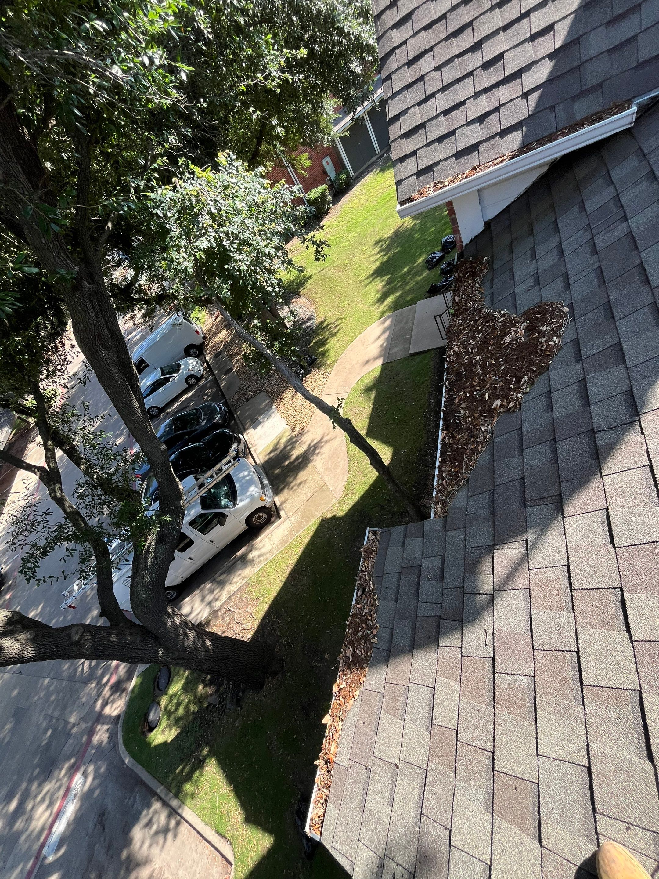 Commercial gutter cleaning Plano & Frisco & McKinney, TX	 before photo with filled gutters