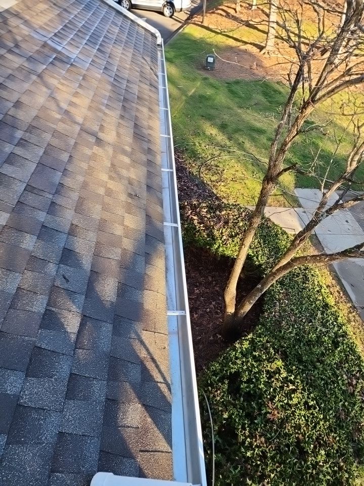 Gutter Cleaning using water by Power Wash Masters LLC