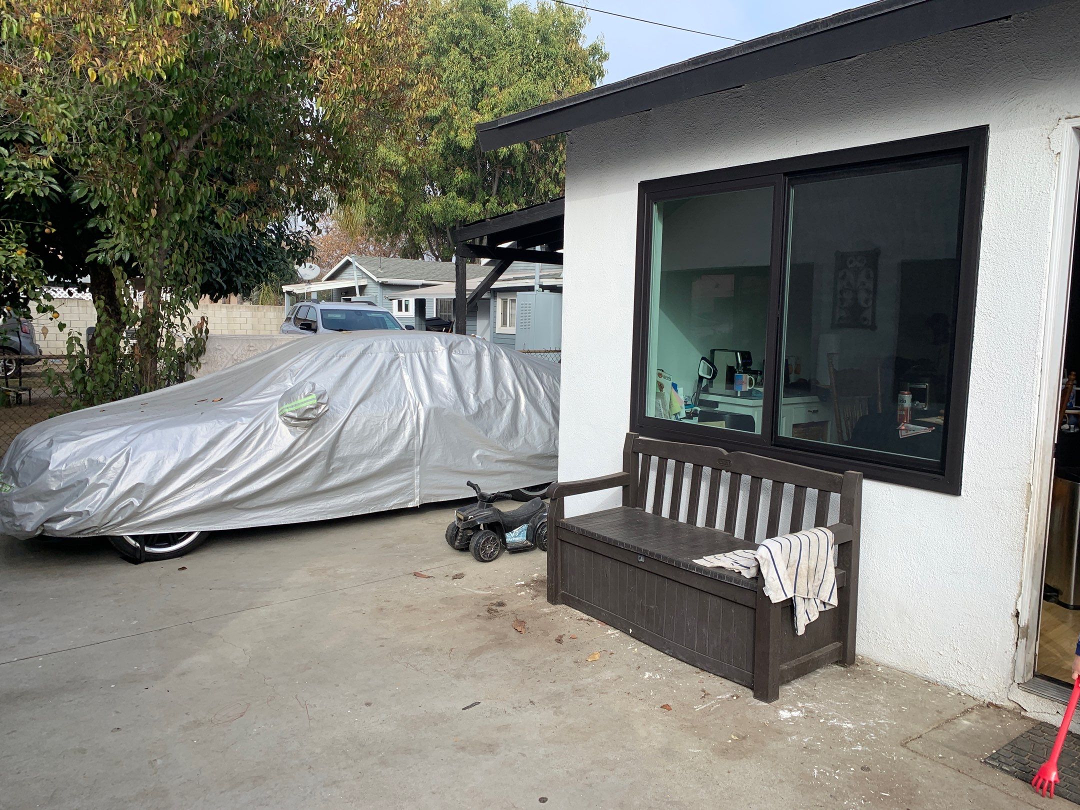 Window Installation using black Vinyl Windows by American Window Company
