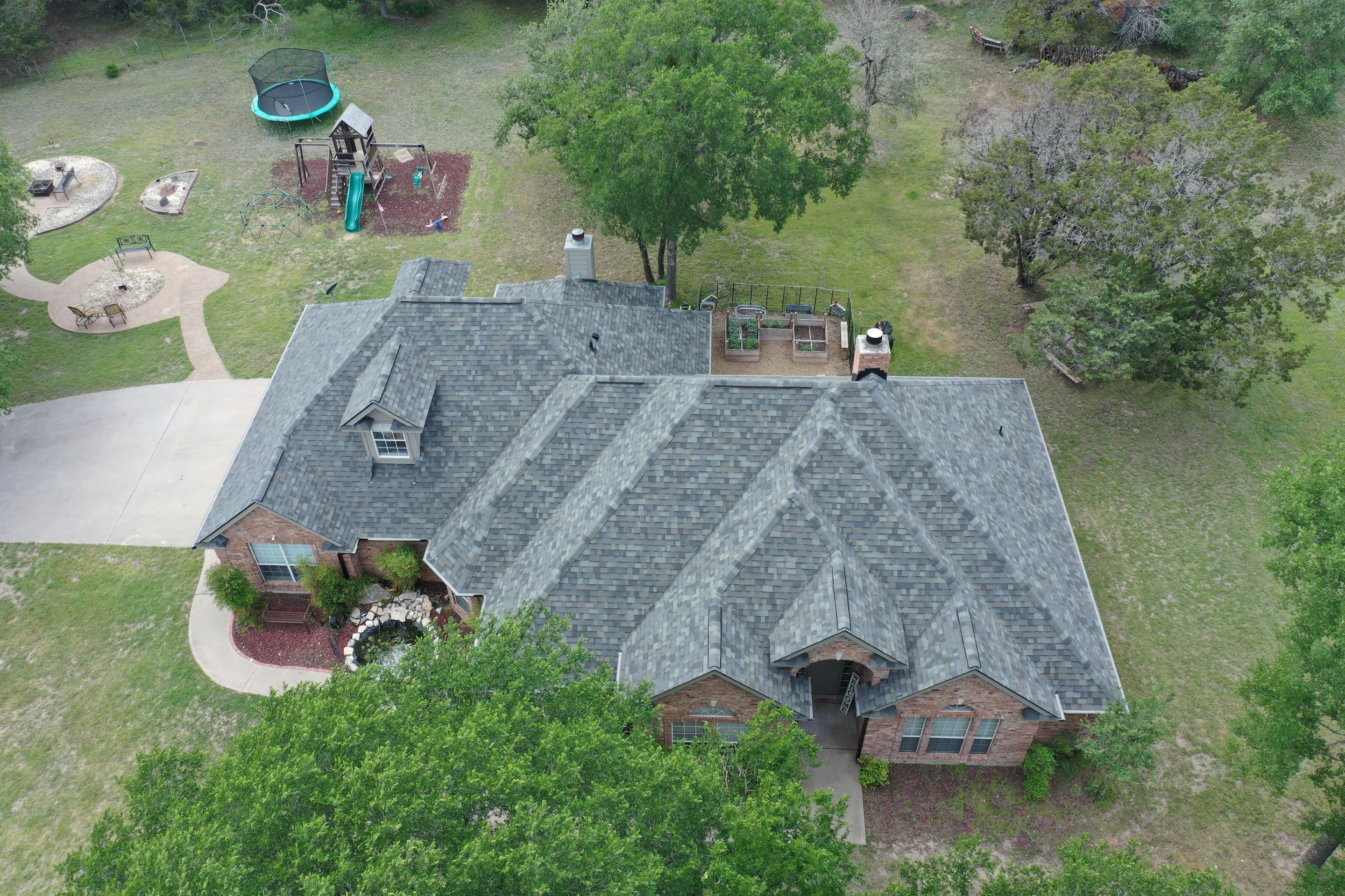 Residential Roof Replacement using Malarkey Vista AR - Storm Grey by Action Exteriors Austin