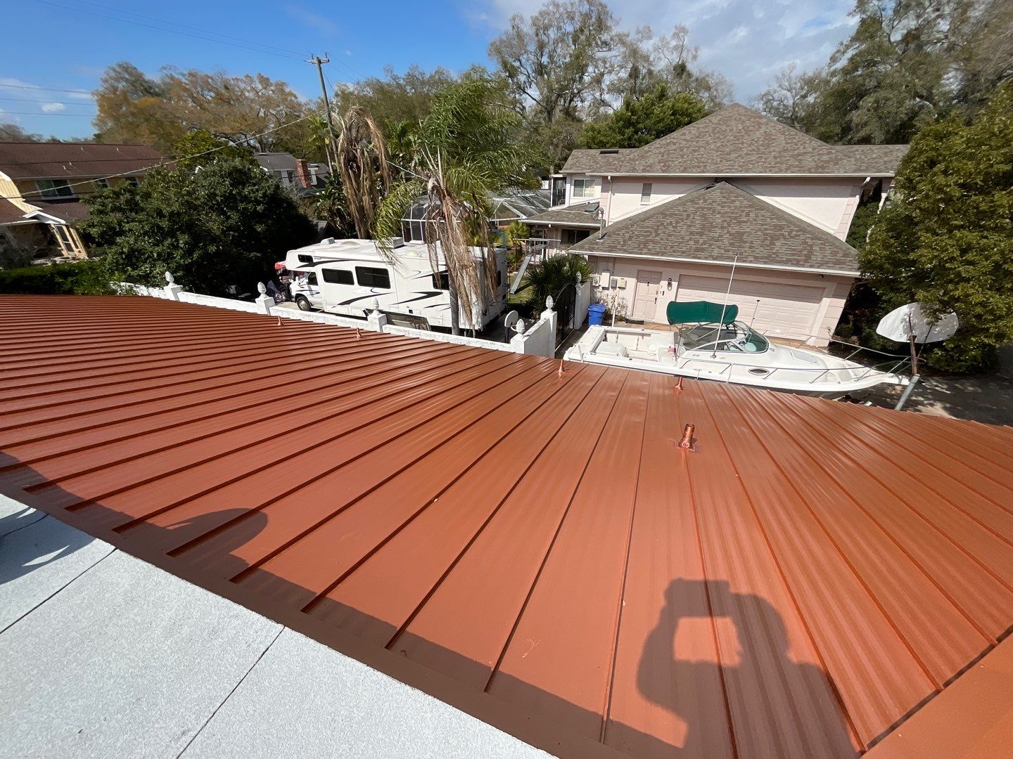 Residential Re-Roof using MS Metals, Copper Penny, Standing Seam. by First Due Roofing
