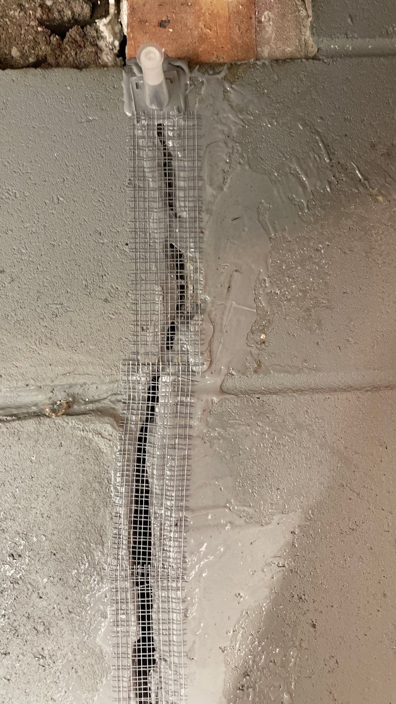 Interior Drain Tile & Sump Pump System in West Minneapolis by Waterproofing Northeast