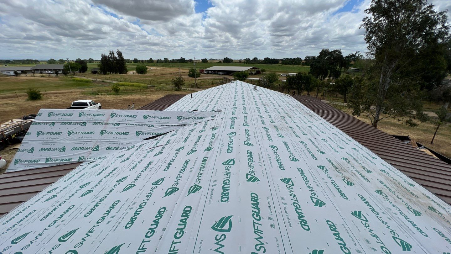 Metal roofing installation using Standing seam metal roofing system by Straight Edge Roofing Inc