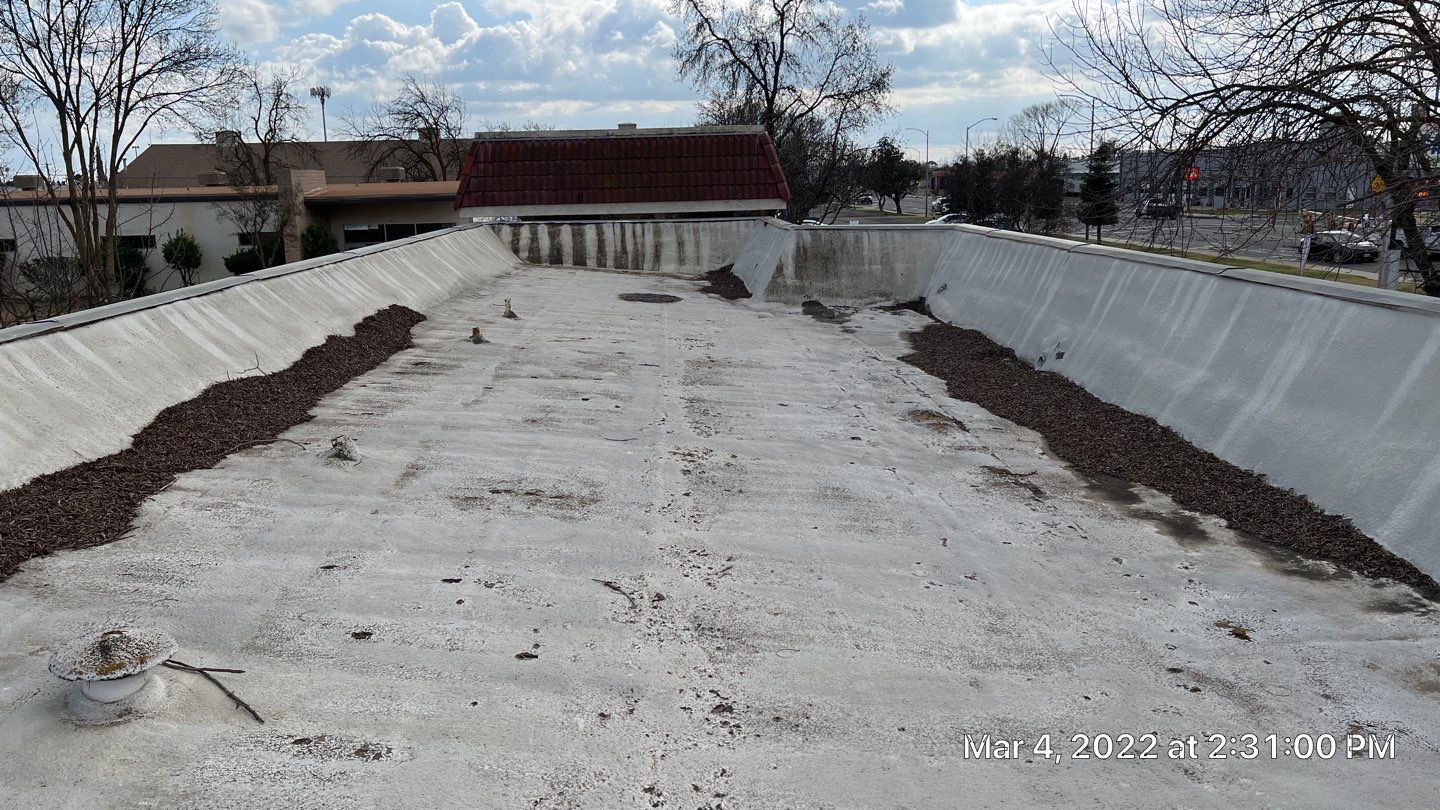 Commercial Roofing Installation using General Coatings acrylic coatings and spray foam by Straight Edge Roofing Inc