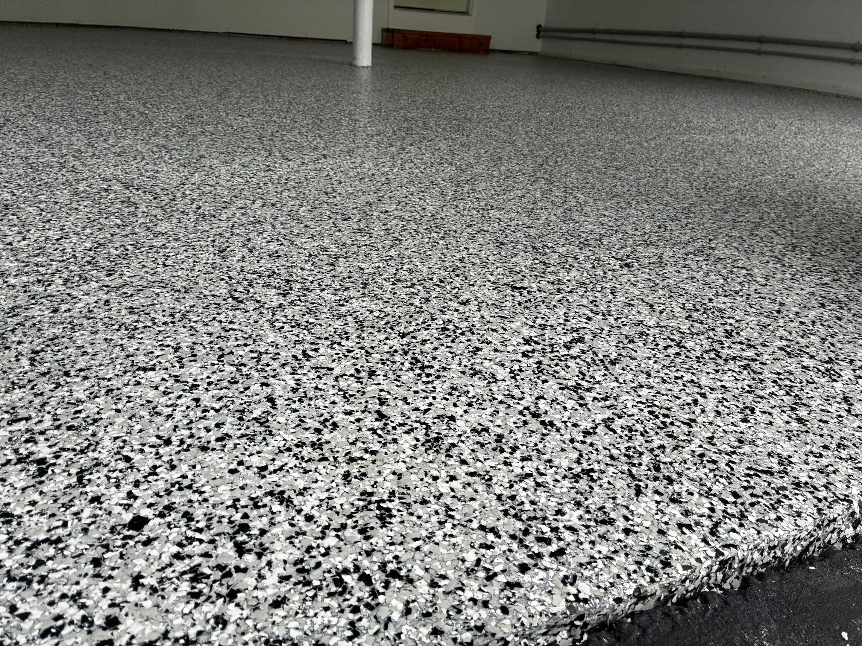 Beautiful Concrete Floor Coating in Domino by DiGiorgi Roofing and Siding Inc