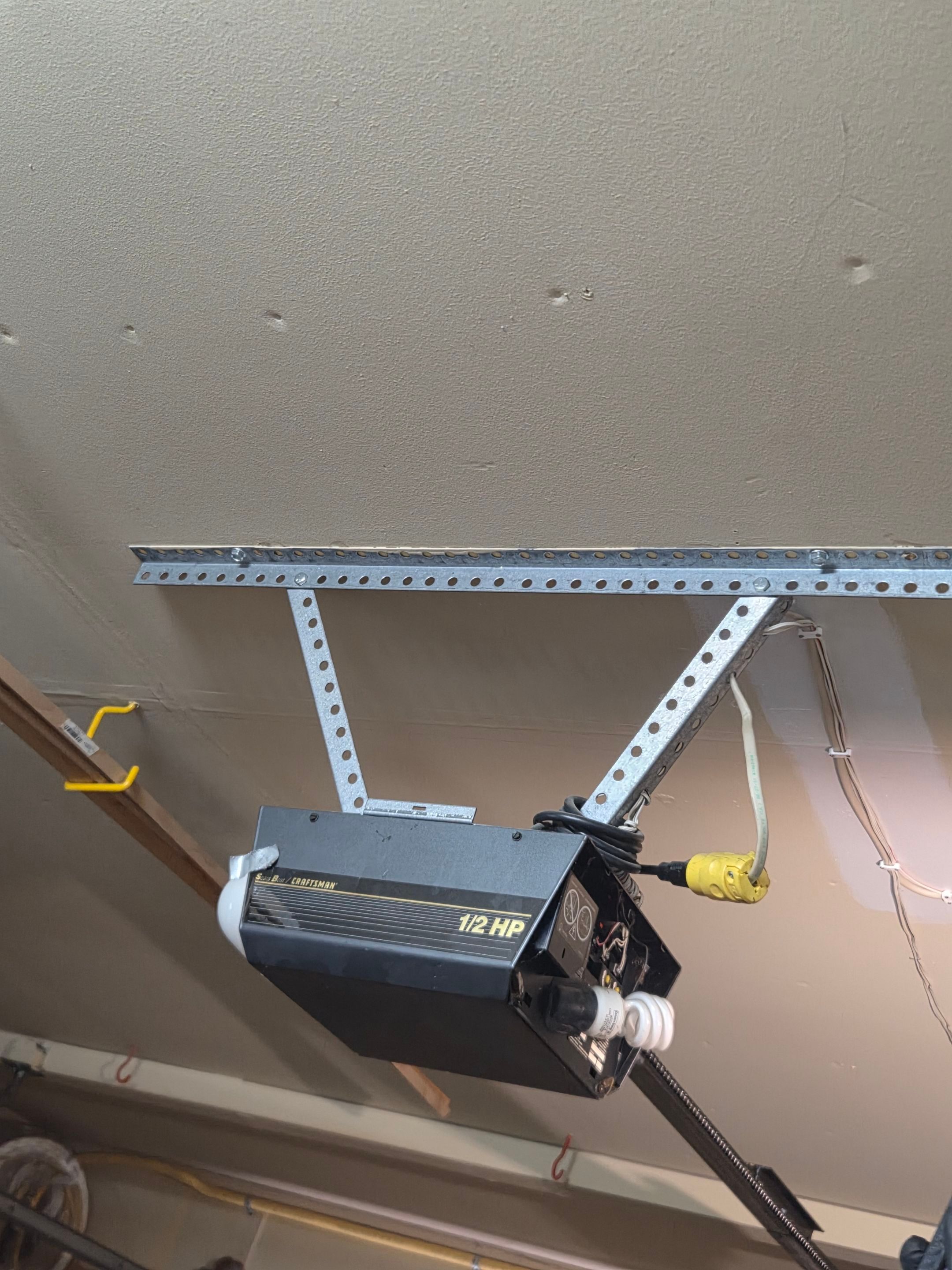 Wood-Grain Sectional Garage Door and LiftMaster Smart Opener Installation in Pleasanton by Valiant Garage Door