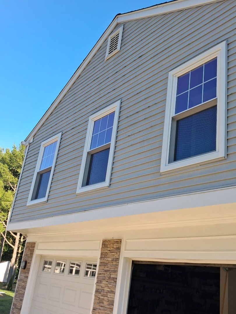 Vinyl Siding and Window Replacement for Annapolis Two-Story Home by Window Depot of Annapolis