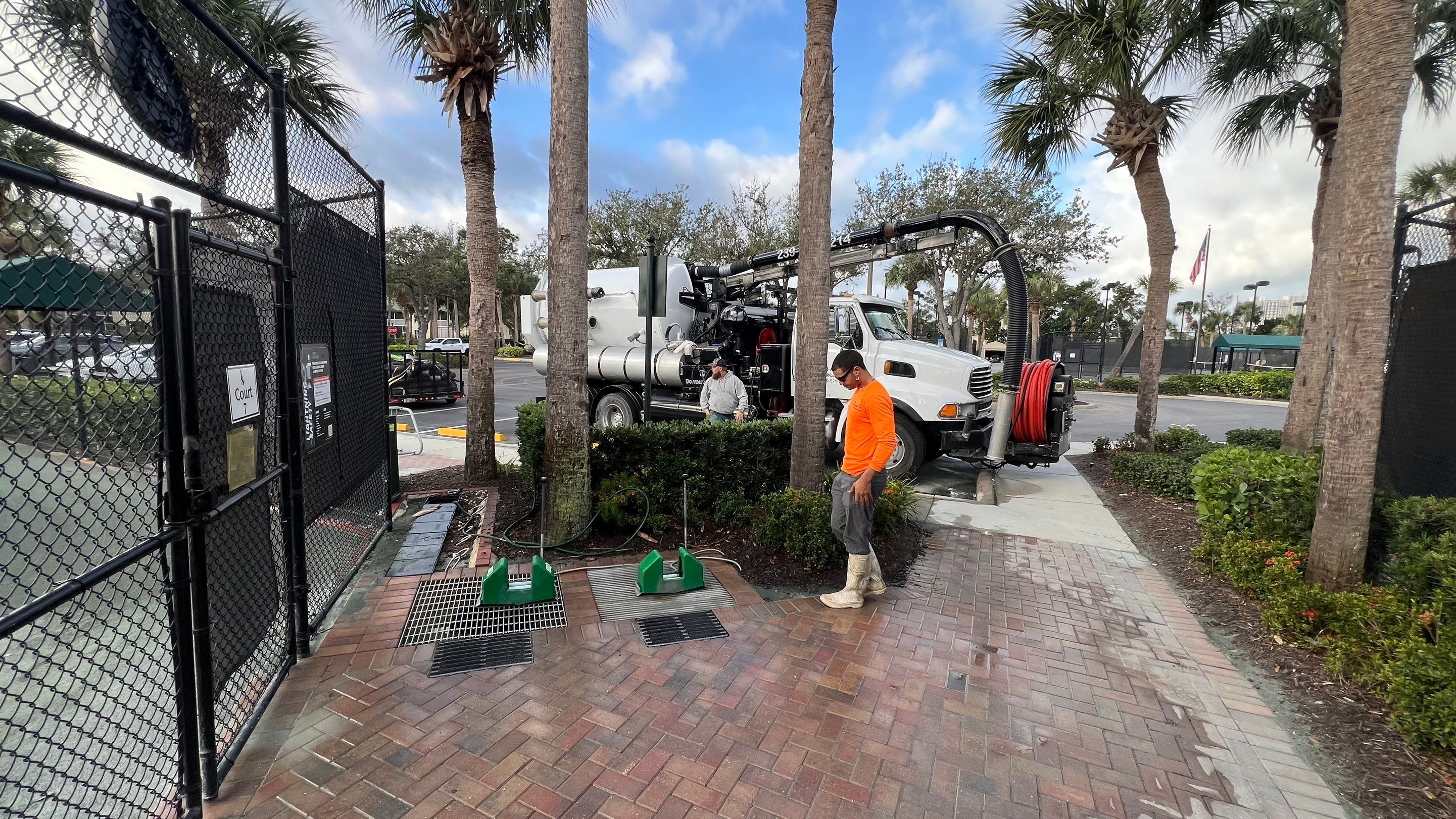 Pelican Landing Tennis Court Catch Basin Cleaning by APS Power & Water