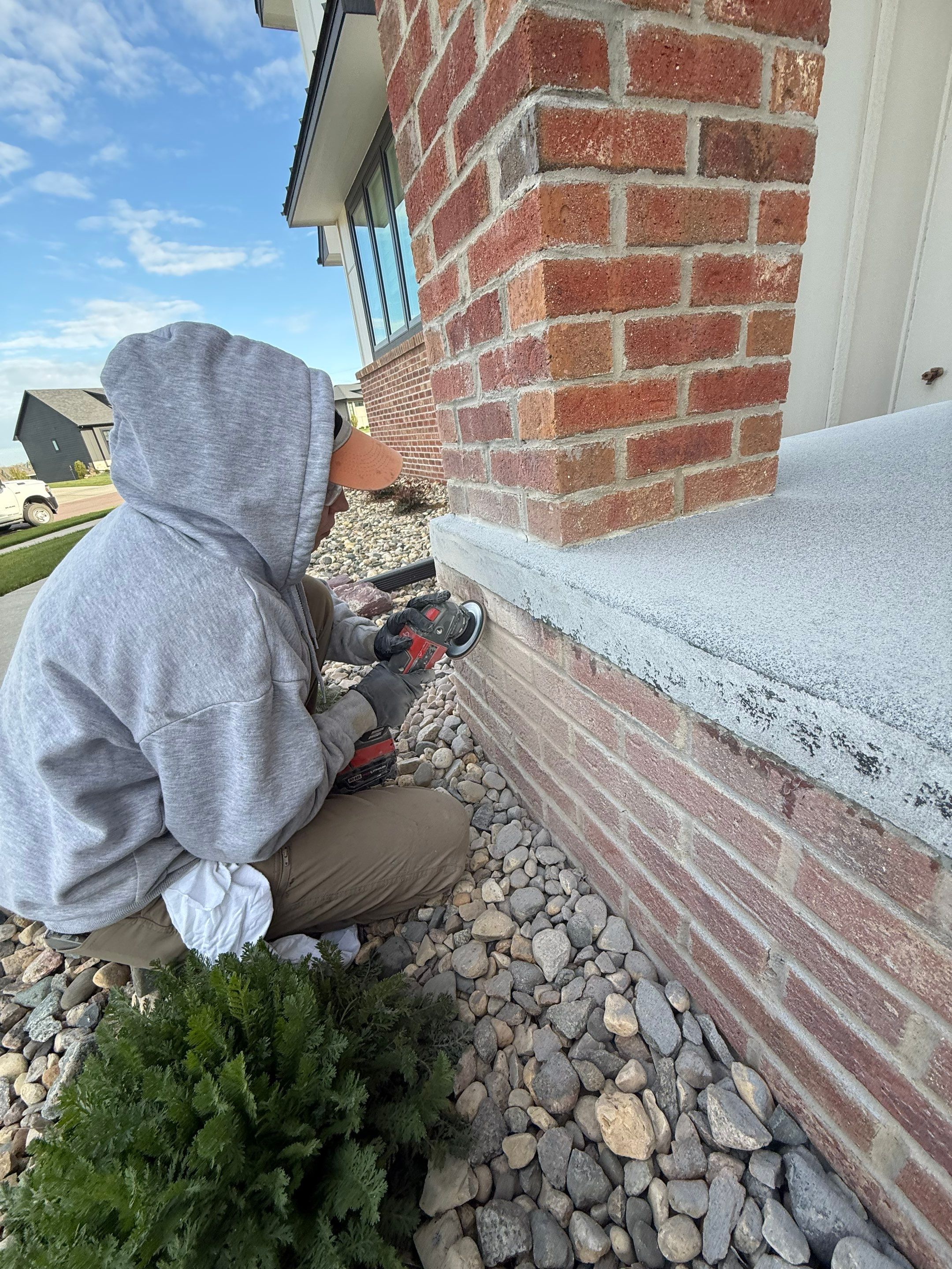 Grey Speckled Concrete Porch Coating for Sioux Falls Home by Select Painting, Coatings & Garage Cabinets