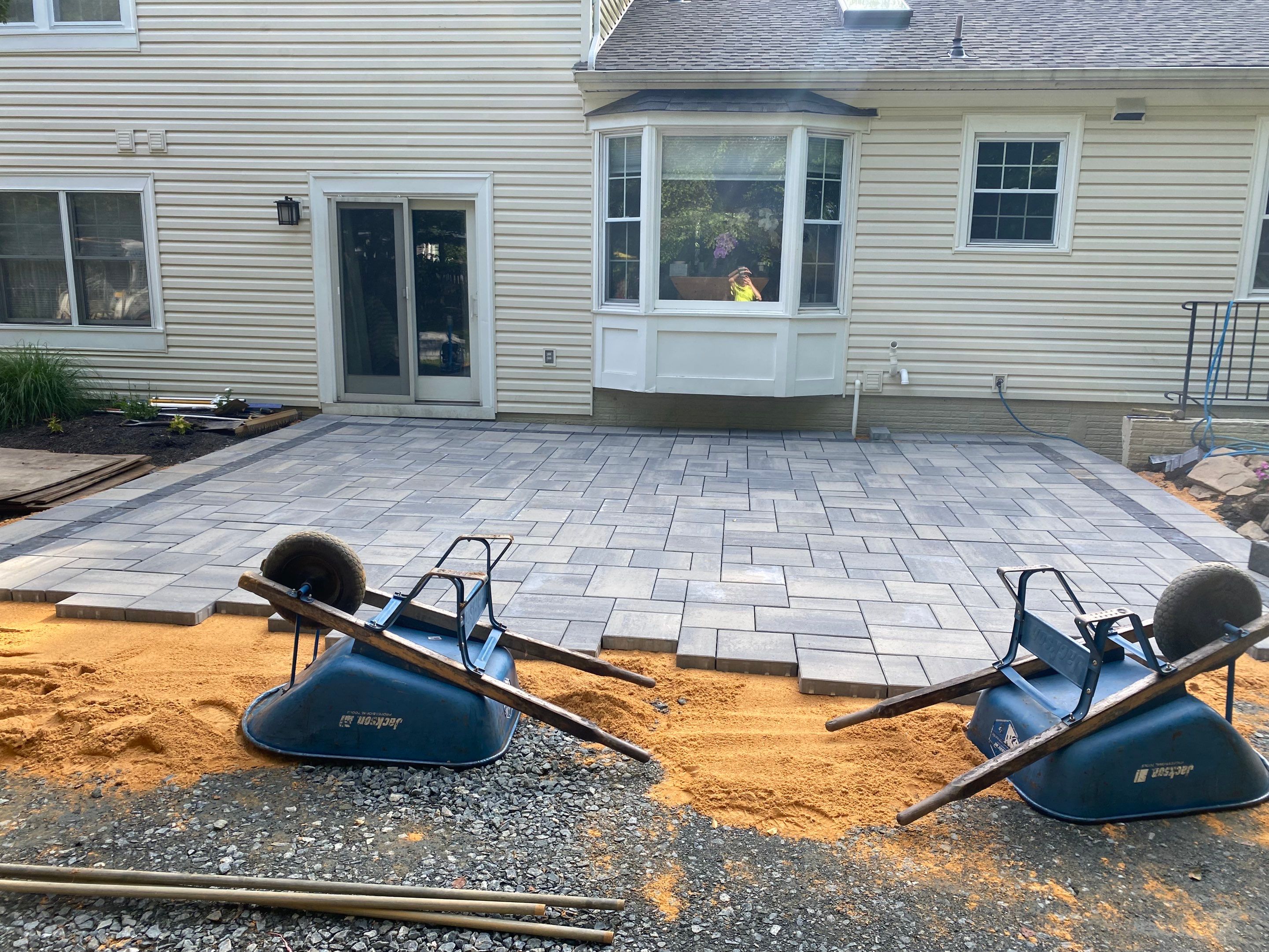 Backyard Transformation using Techo-Bloc Pavers by The Smet Companies, LLC