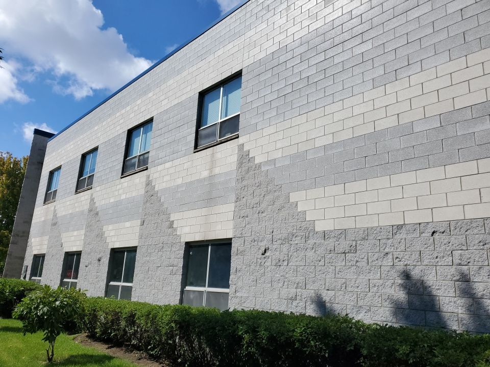 commercial pressure washing using Algaecide, soft wash soap by Northern Power Washing LLC.