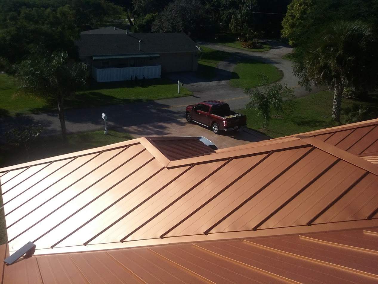 Residential Roofing Installation using 1" Nail strip metal roof by BLUES BROTHERS CONSTRUCTION CORP