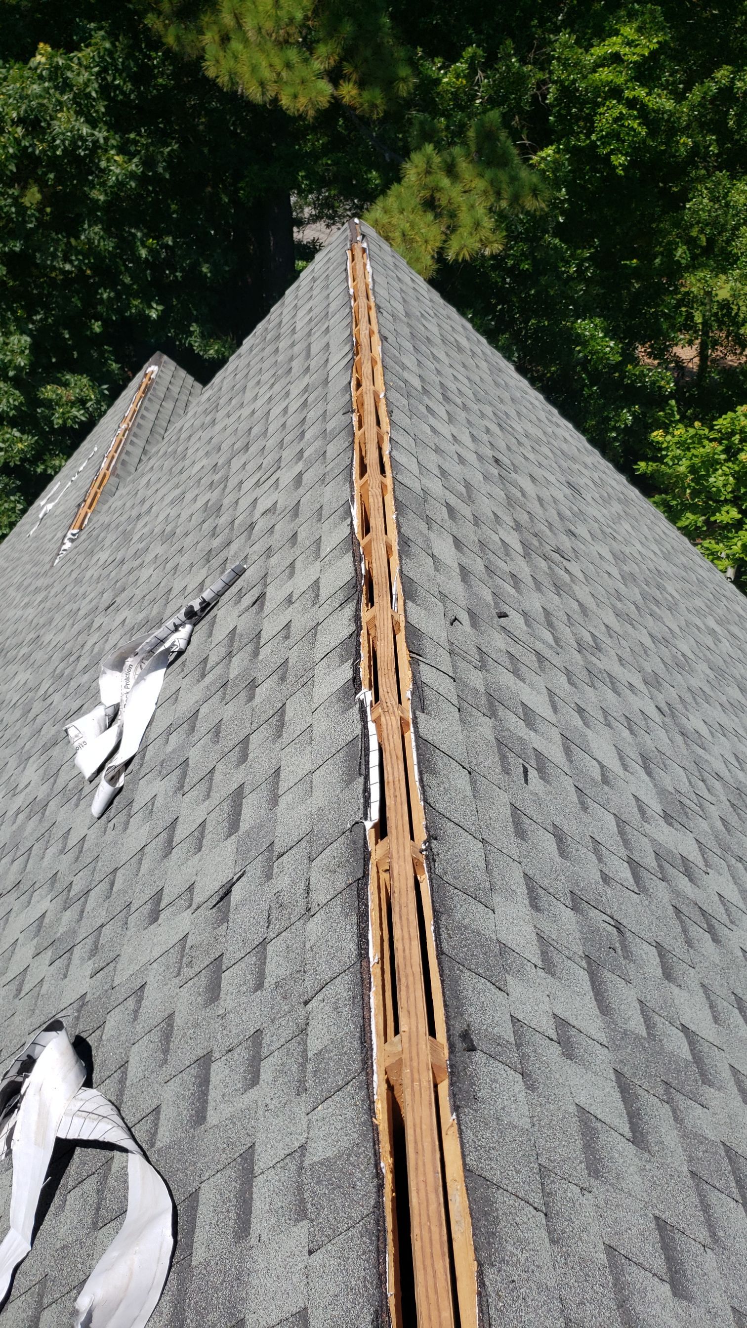 Residential Roofing Installation using Roof Replacement by American Roofing & Construction LLC