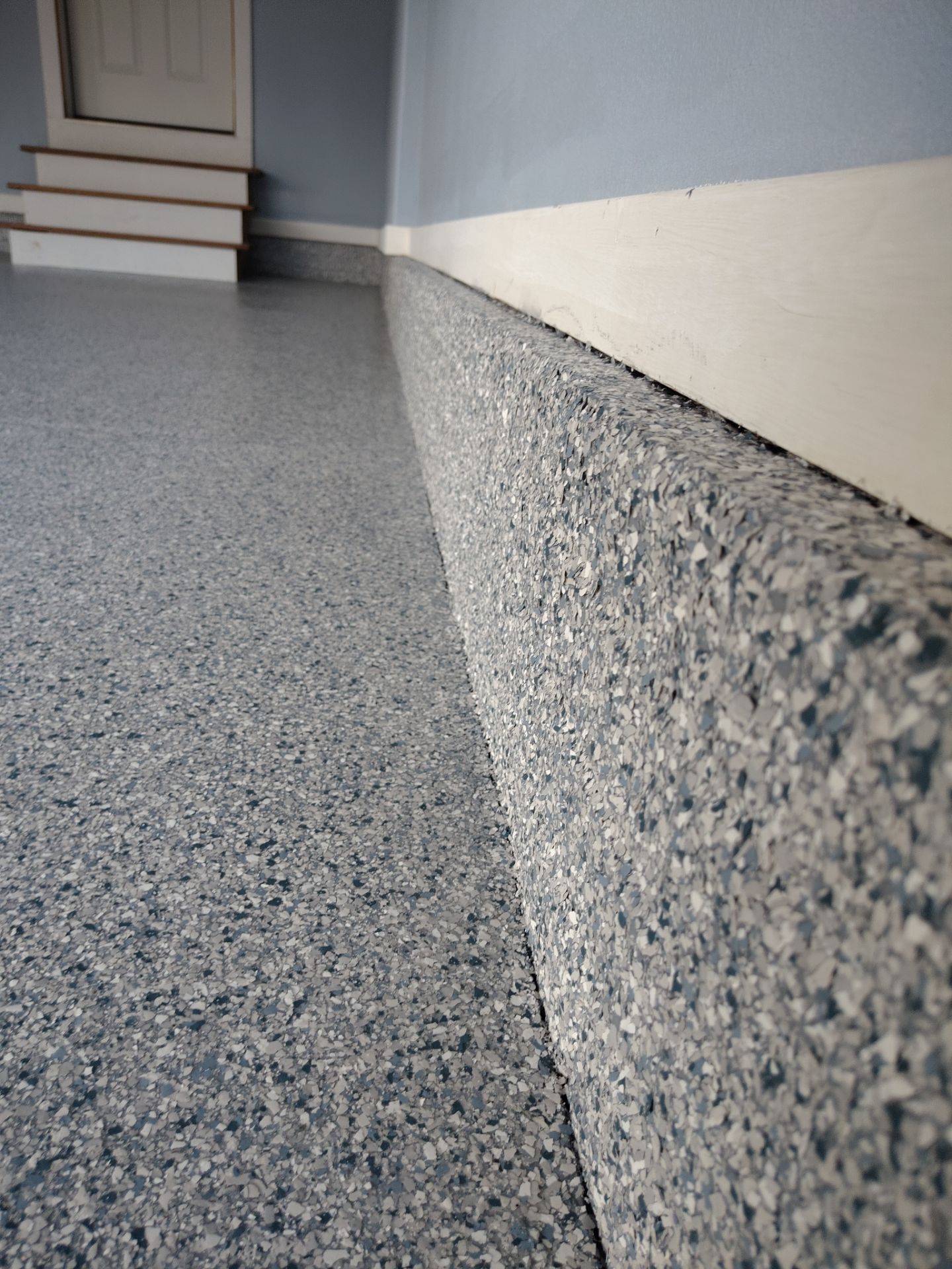 Tidal Wave Garage Transformation in Adel, Iowa by Revival Concrete Coatings