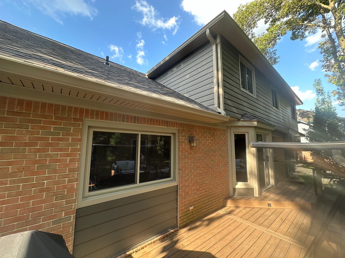Roof Replacement using Owens Corning Peppercorn and Siding Replacement using Ascend Charcoal Smoke by 180 Contractors