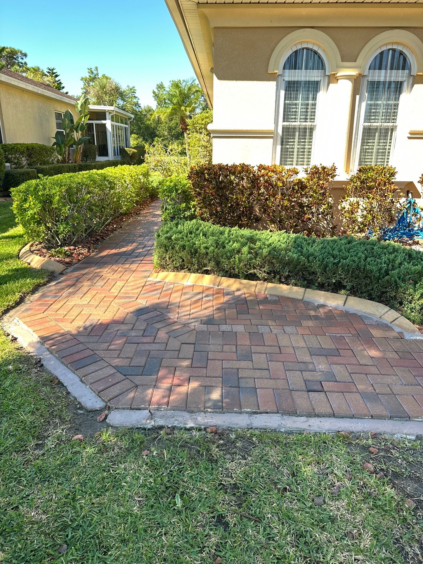 Restoring Multi-Tone Paver Driveway and Walkways in Sun City Center by Supreme Paver Experts