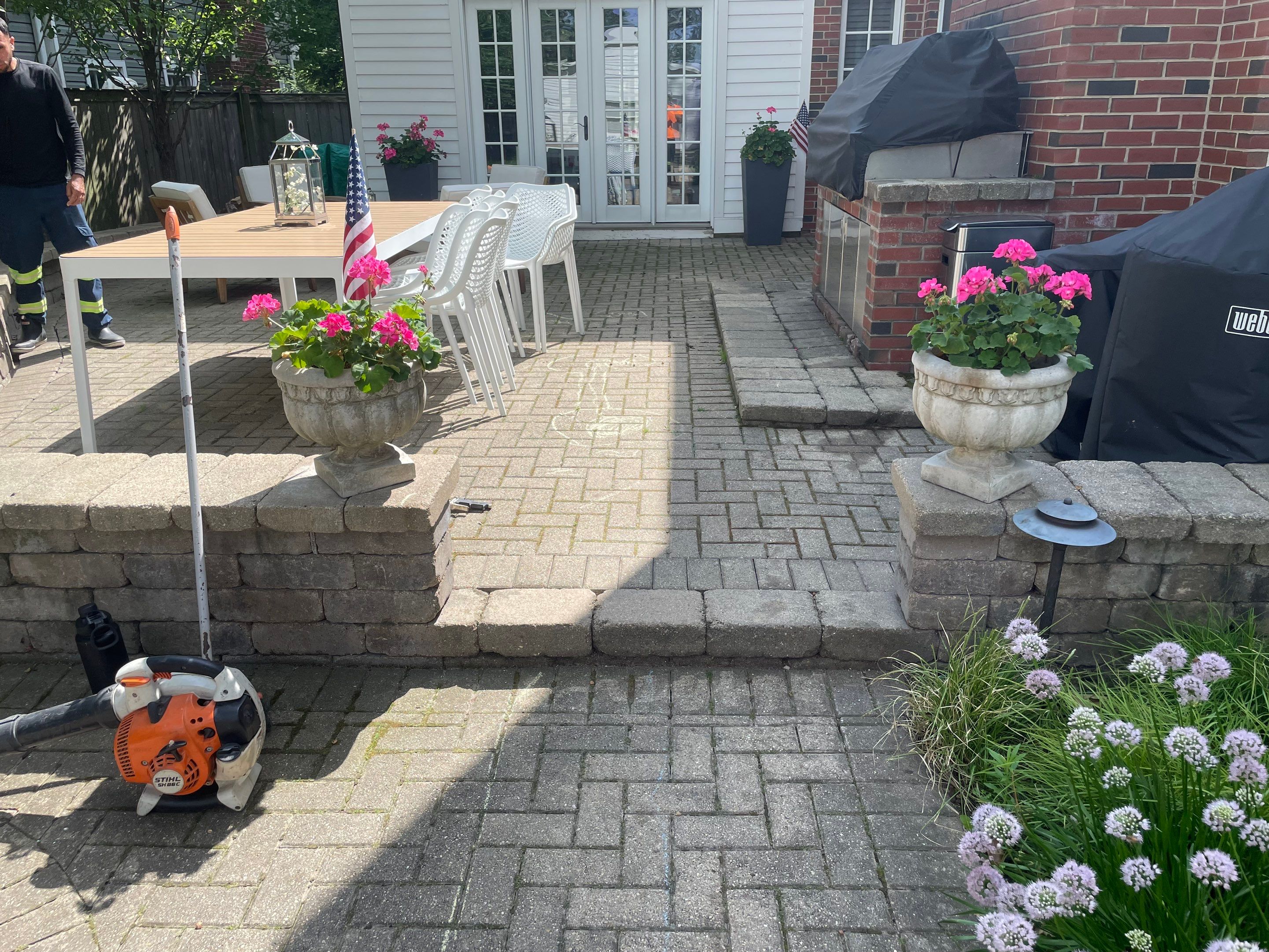 Brick patio repair, clean sand and seal by Northern Power Washing LLC.