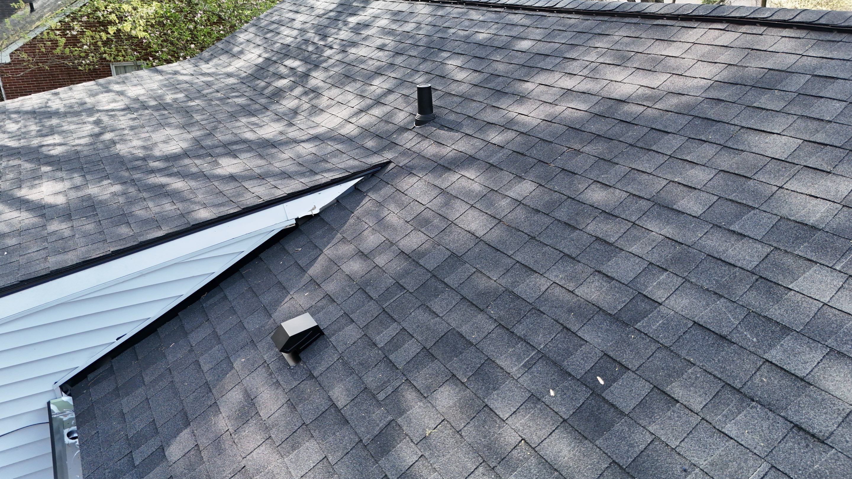 Charcoal Black Re-Roof by Royal House LLC