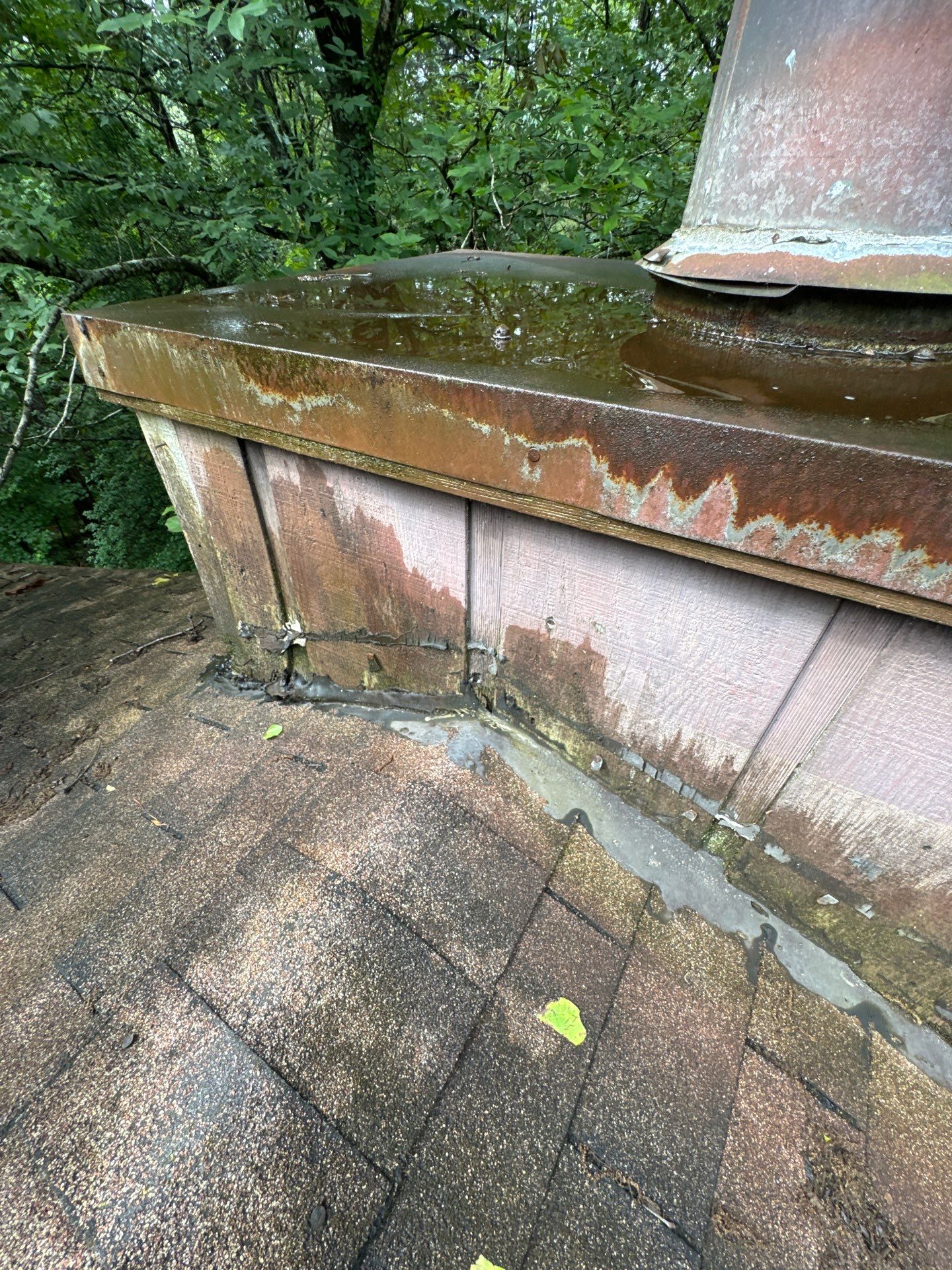 Gutters and Siding Repairs and Chimney Reflashing in Bessemer by The Roofing Dudes