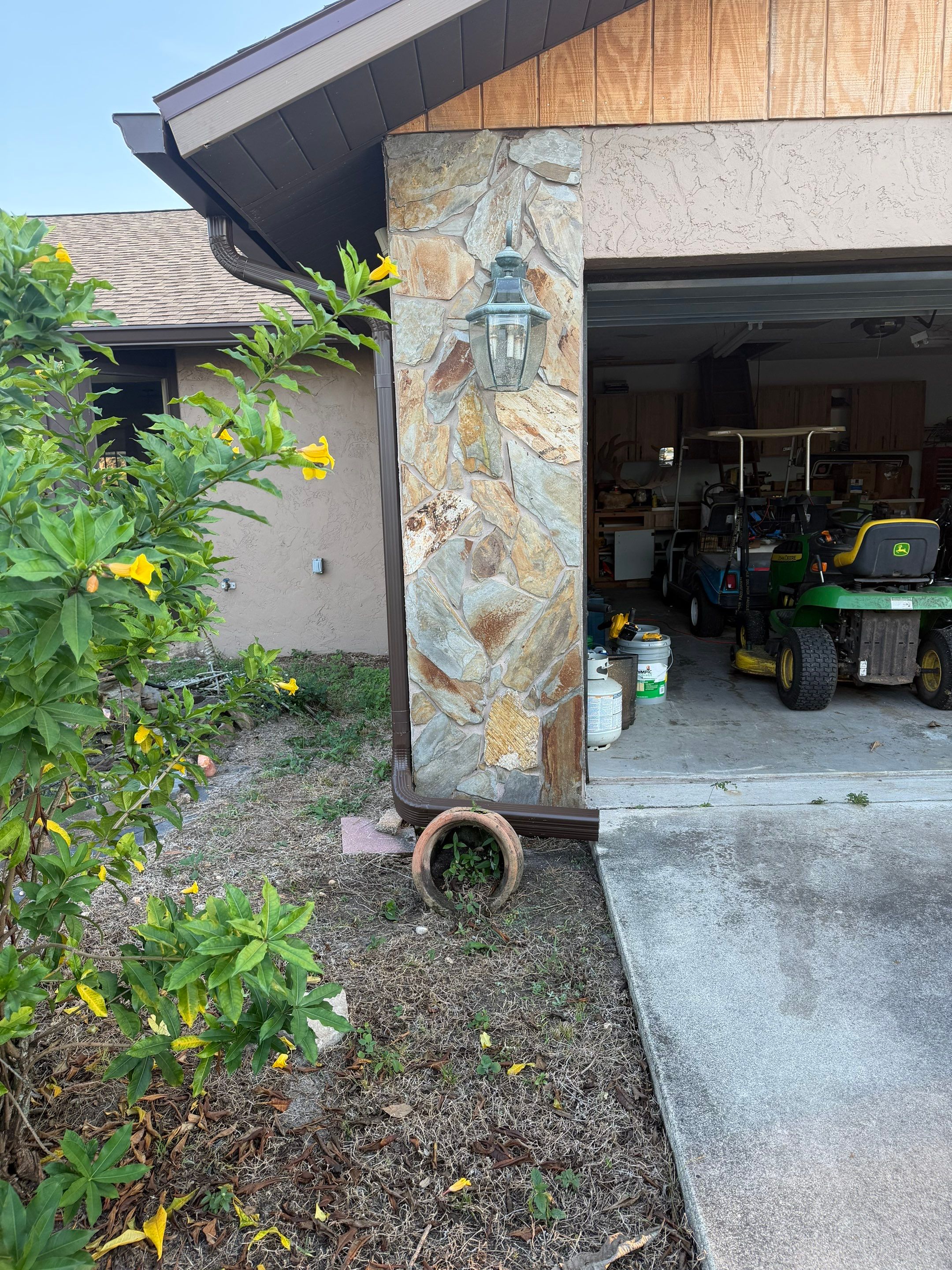Brown Seamless Gutters for Beach Cottages in Sarasota FL by Gutter Professors