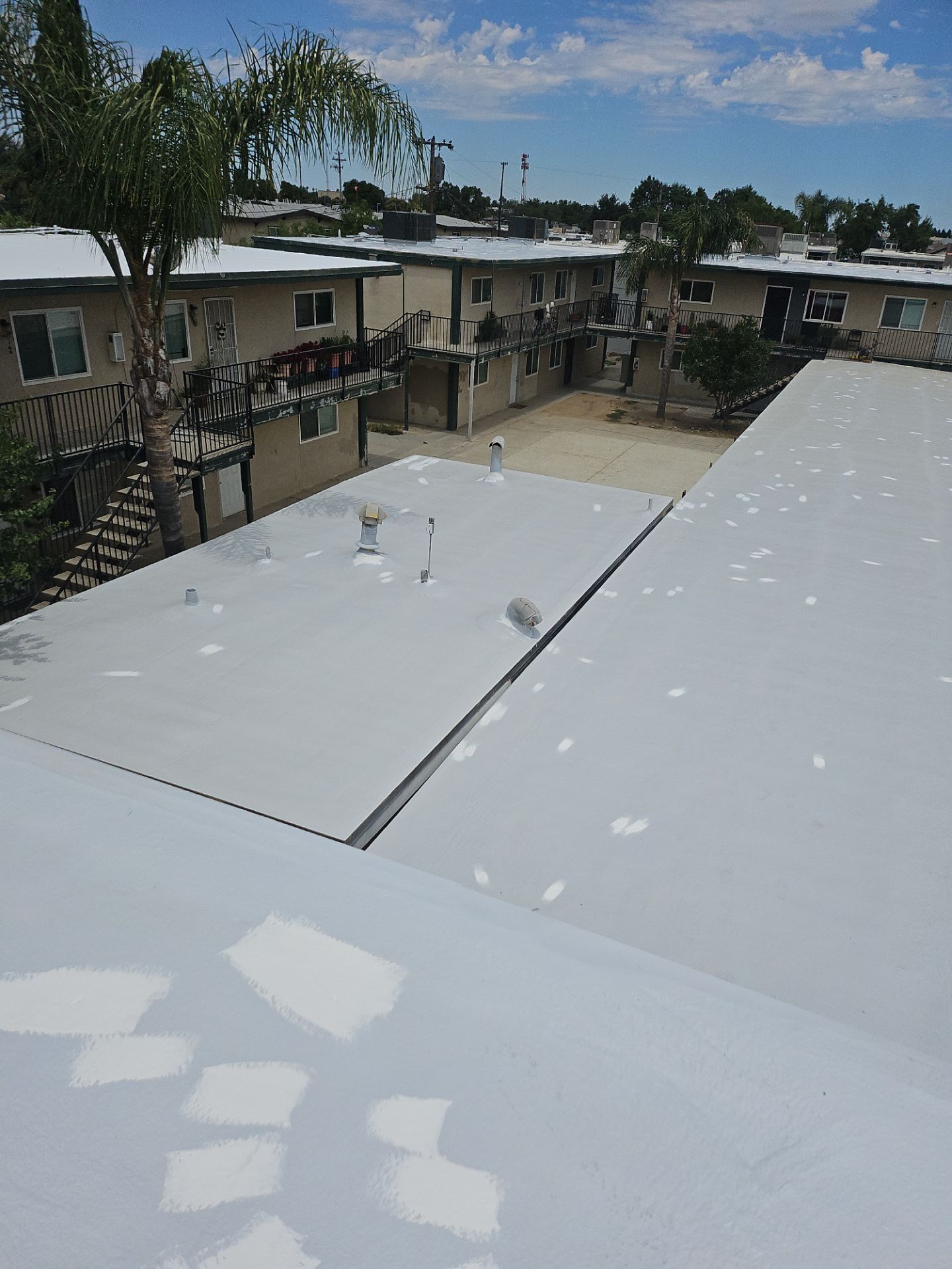 Foam Refurbish using General Coatings acrylic coatings and spray foam by Straight Edge Roofing Inc