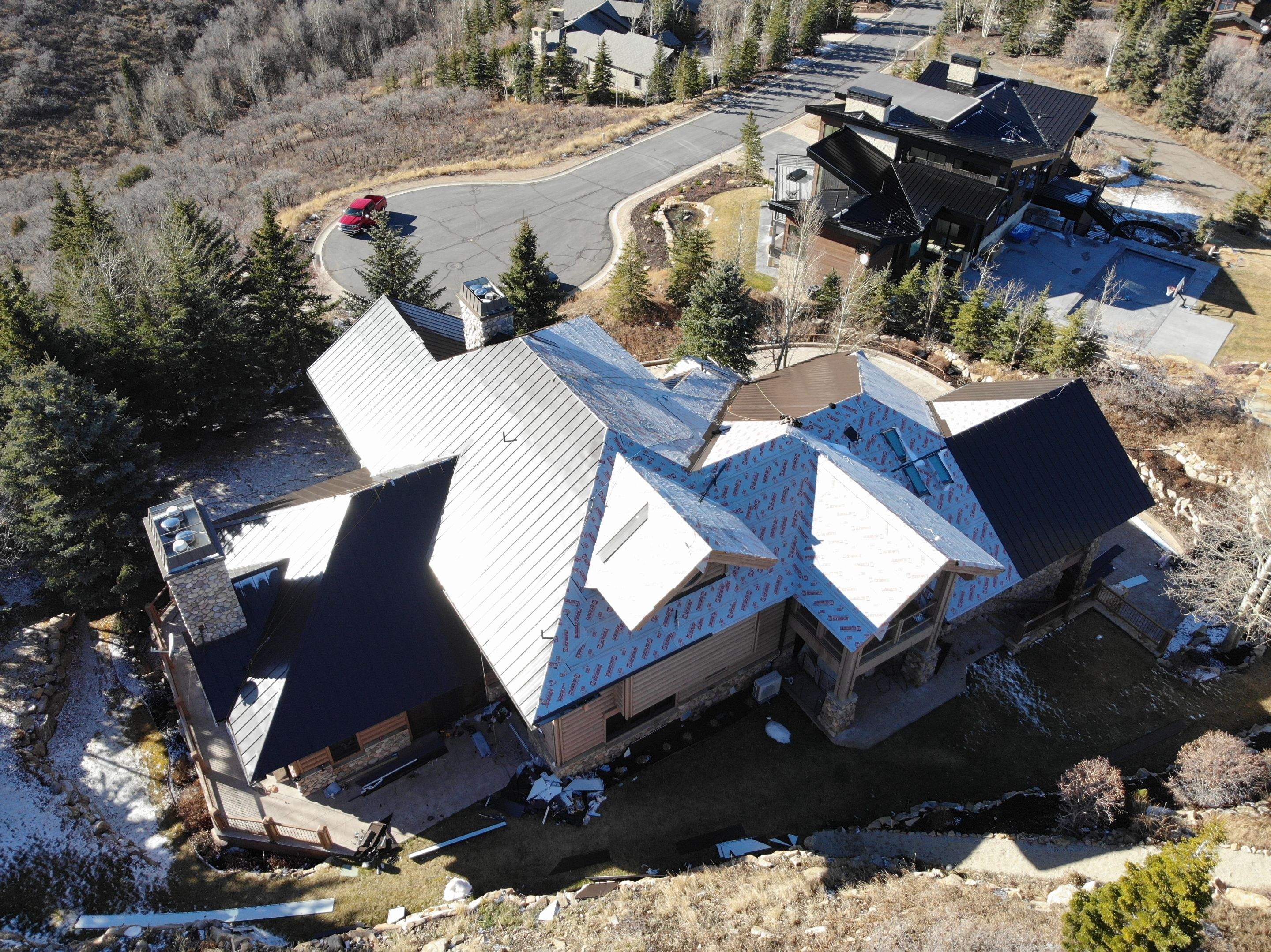 Standing Seam Metal Roof Replacement After Snow Damage by ASAP Roofing & Restoration