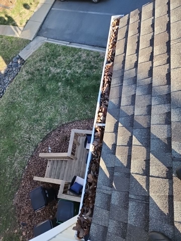 Gutter Cleaning using water by Power Wash Masters LLC