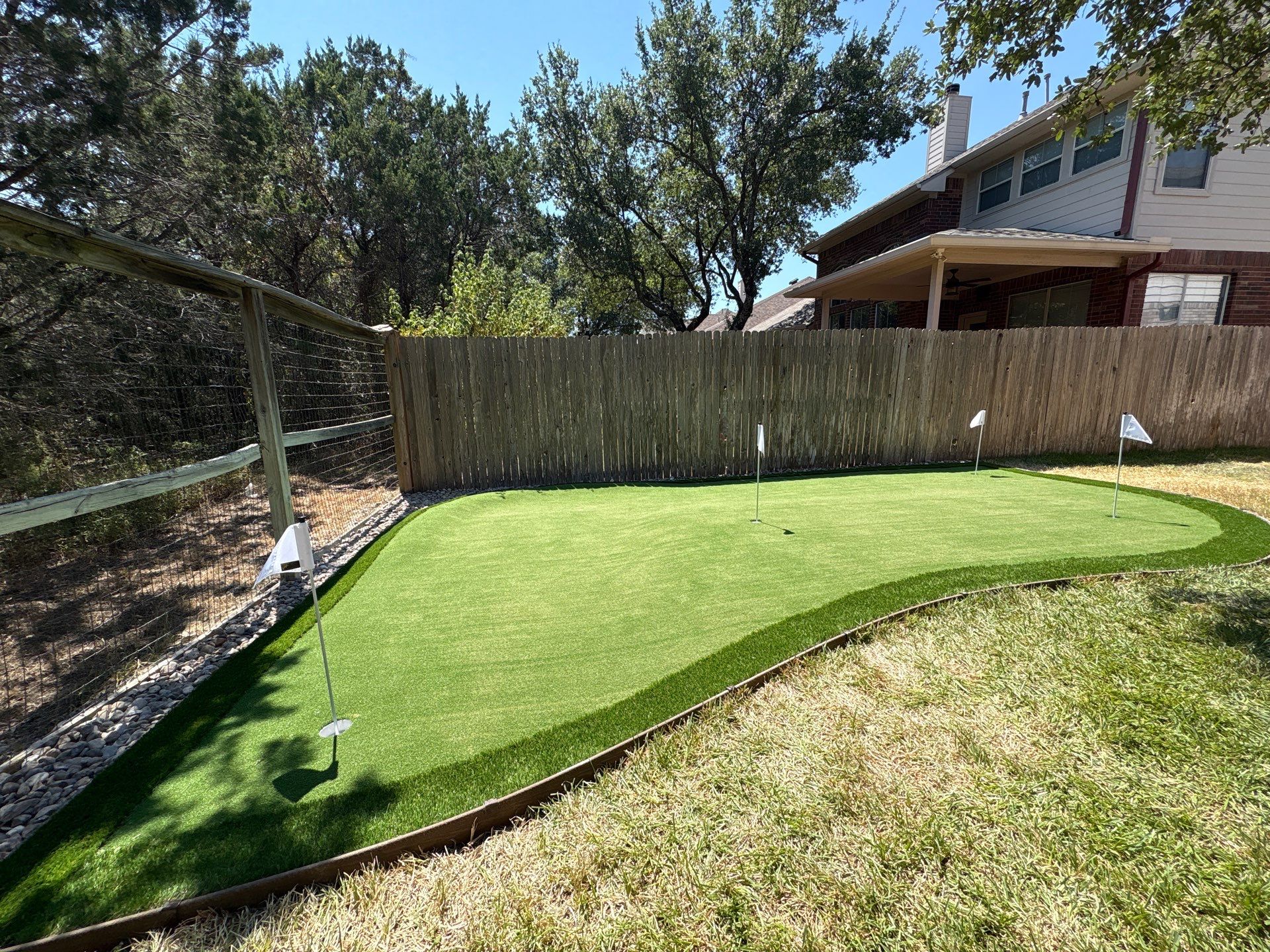 Putting Green by Singer Services
