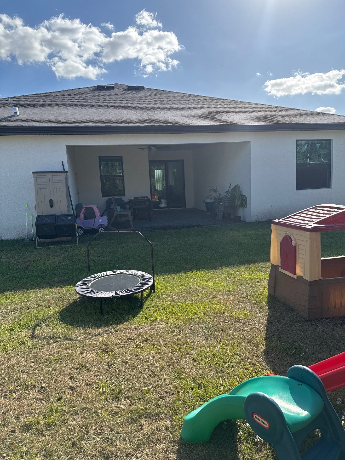 Dark Seamless Gutters and Downspouts in Cape Coral FL by Gutter Professors