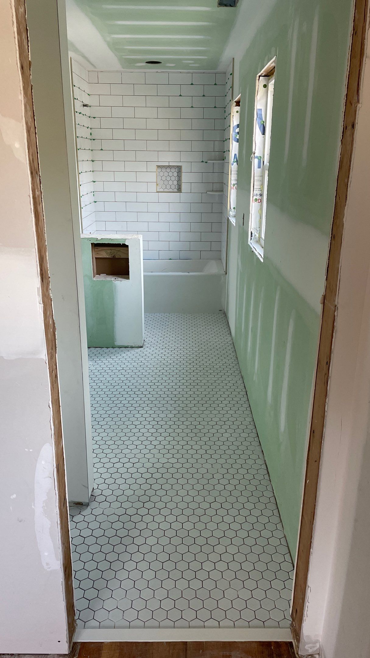 Remodeled Home with new tile floors, Showers and Refinished Oak Floors with stain and Waterbased Finish by Footprints Floors of Coastal Carolina