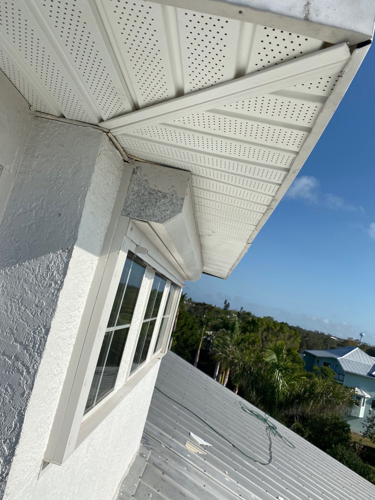 Seamless Gutter Installation for Beach Homes in Sarasota FL by Gutter Professors