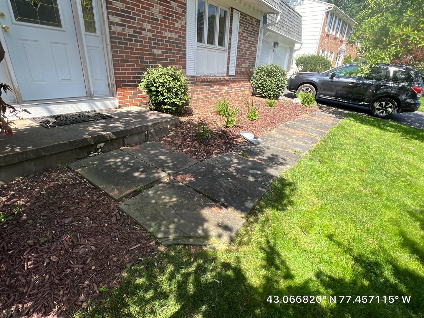 Ashlar slate stamped concrete patio  by NG Masonry & Construction LLC
