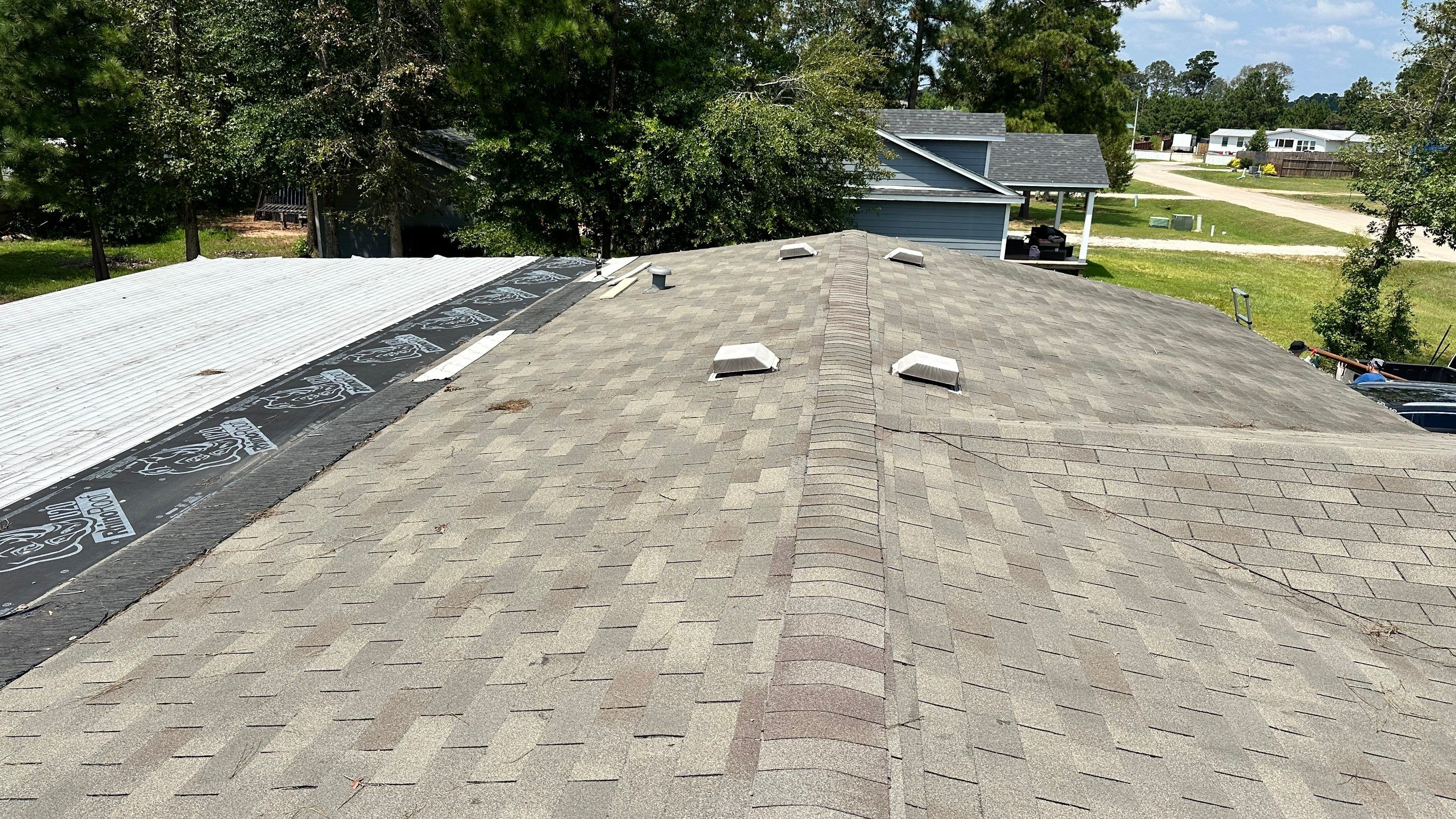 Roof Replacement with Deck Repairs & Flat-Roof Section — Conroe, TX by PL Roofing & SB Roofing, LLC.