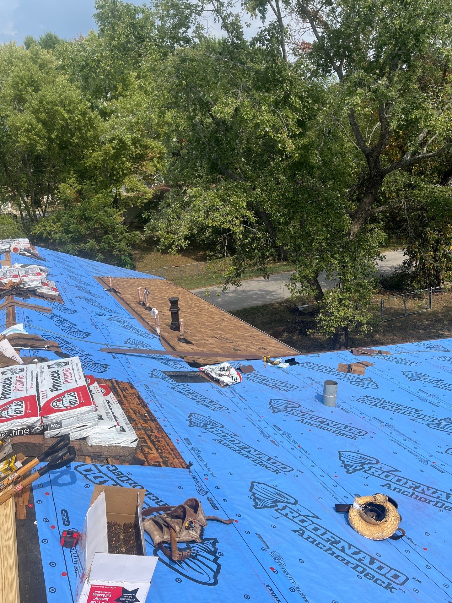 Residential Roofing + Gutters & Downspouts Install  by Titan Commercial & Residential Roofing 