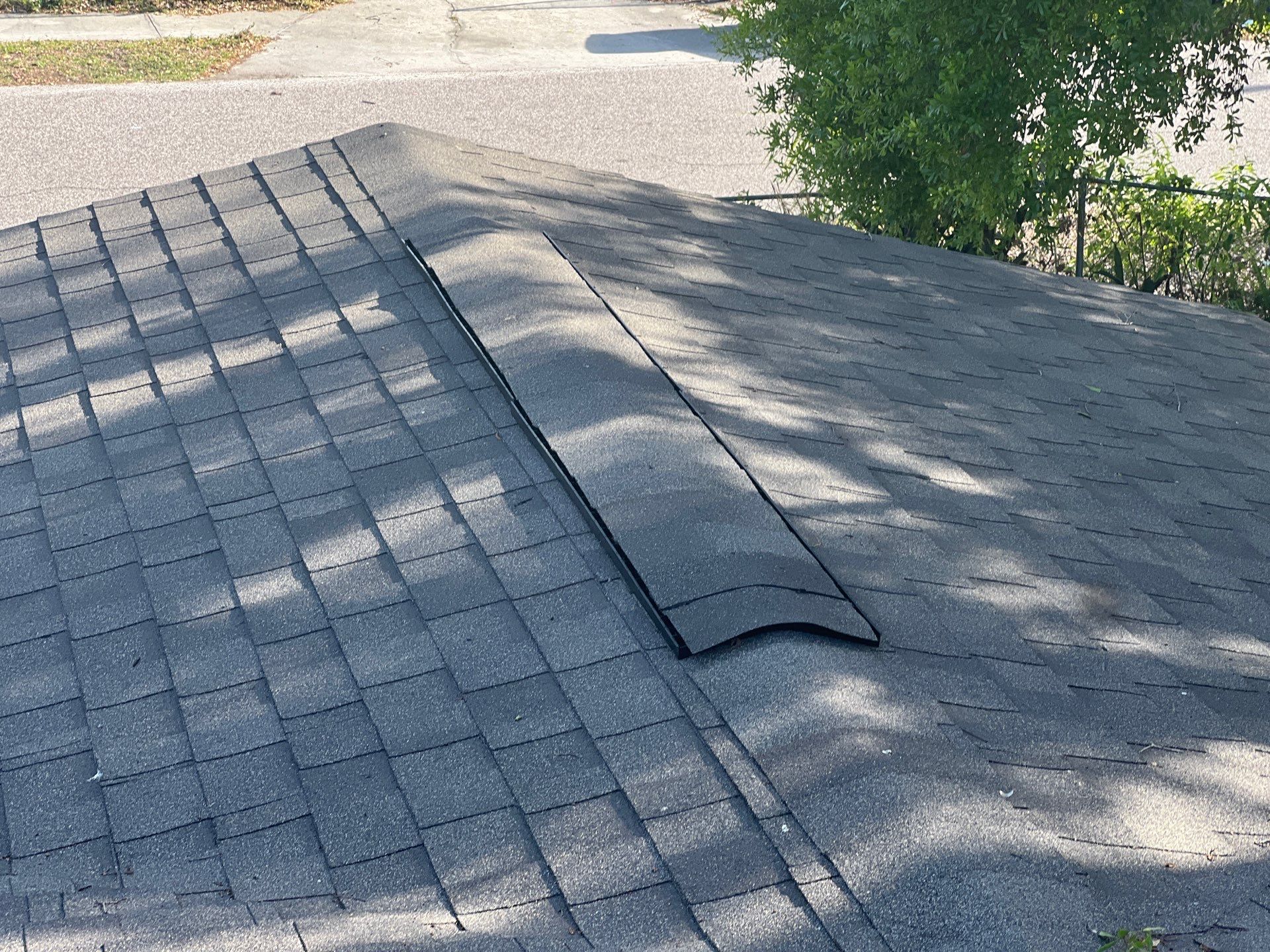 Estate Gray Shingles by Reimagine Roofing