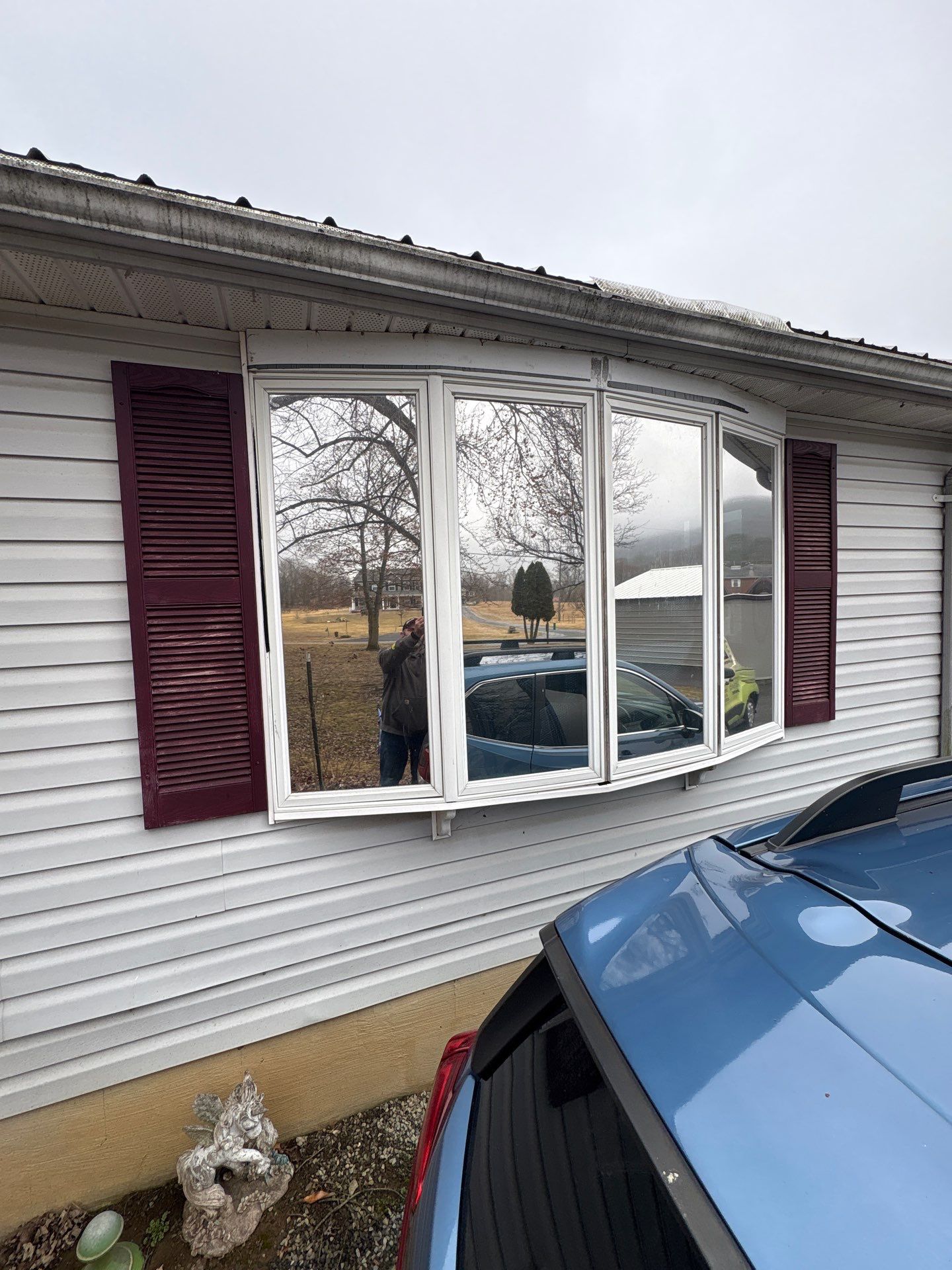 Entry Door with sidelite and storm door and bow by Aspen Home Improvements