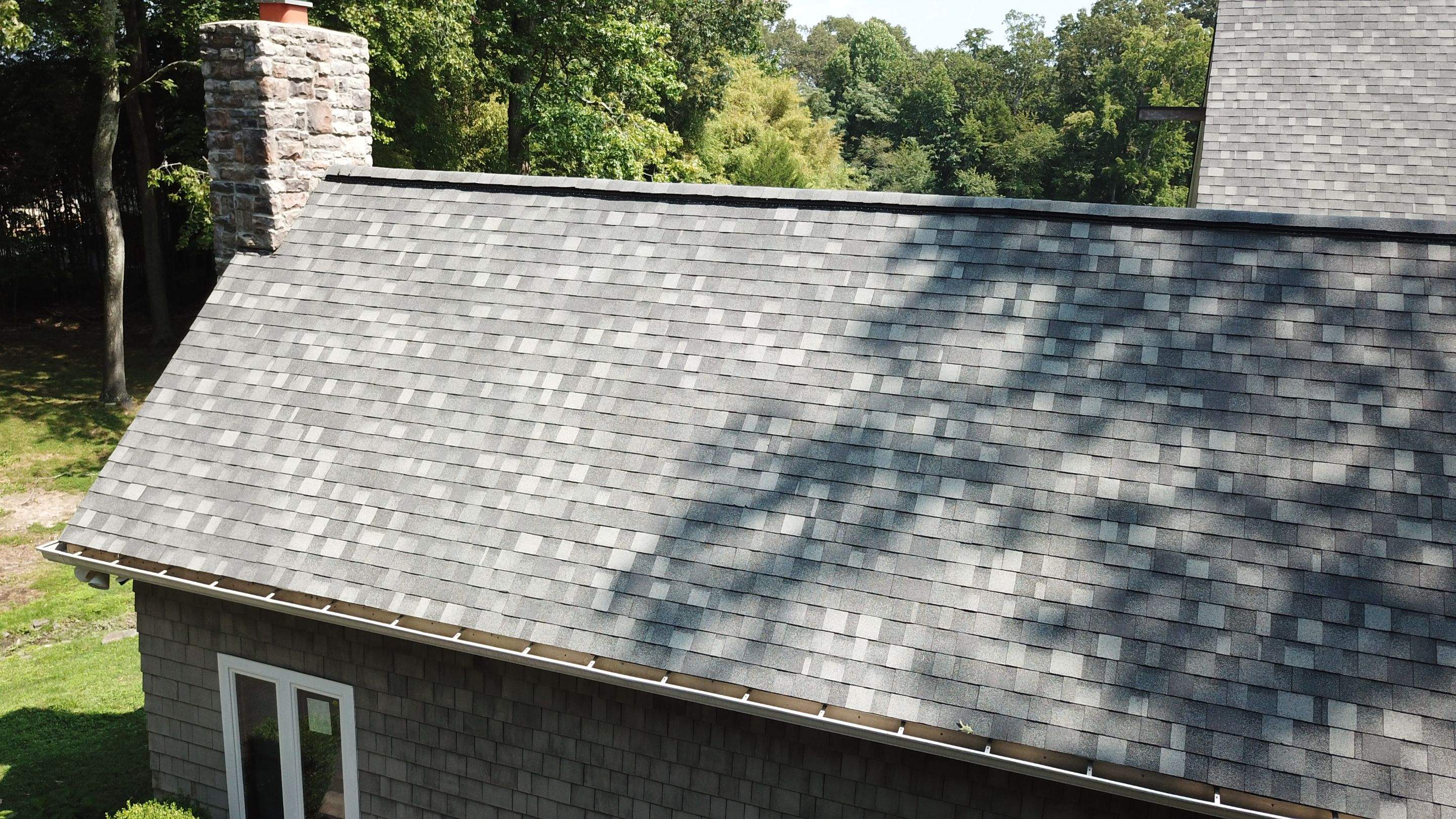 Roof Replacement using IKO Dynasty by American Home Contractors